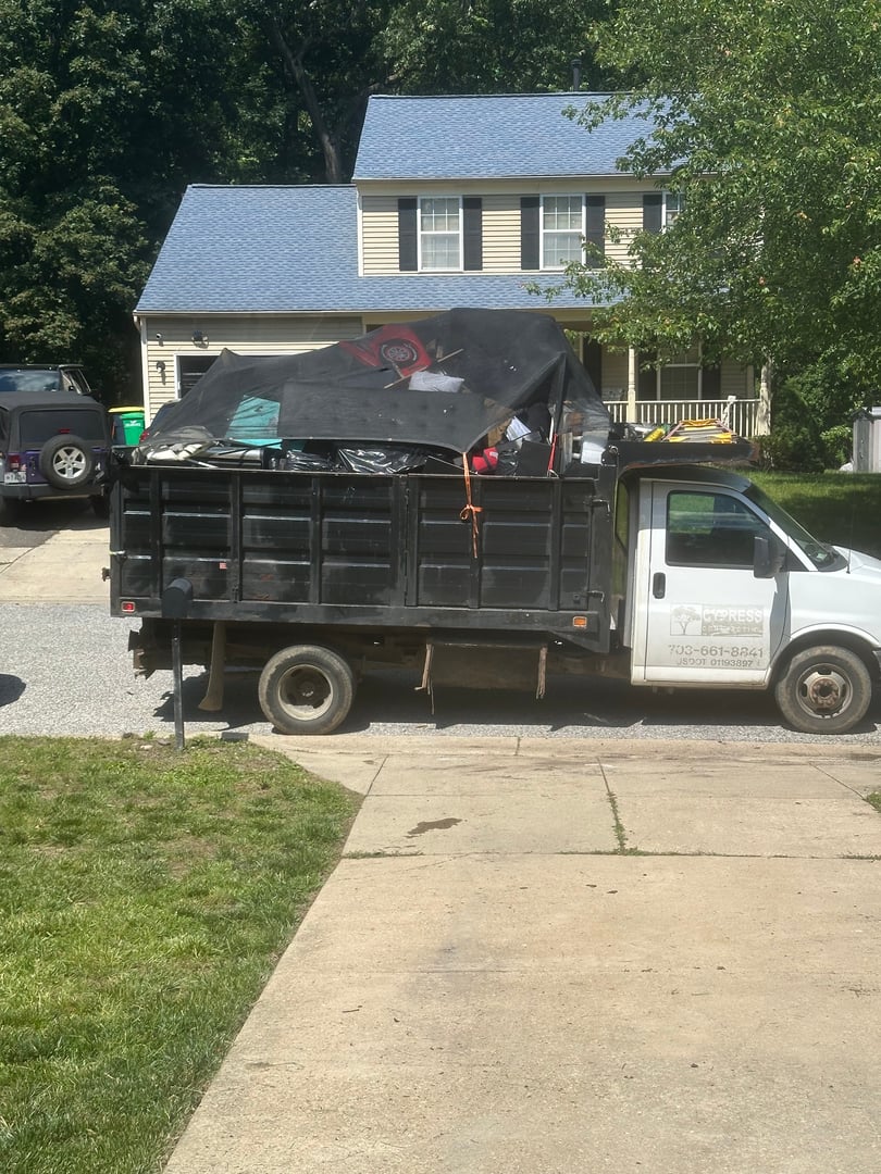 TILTZ junk removal truck and team