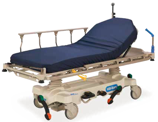 A hospital stretcher with a blue mattress, adjustable side rails, wheeled base, and an attached IV pole.