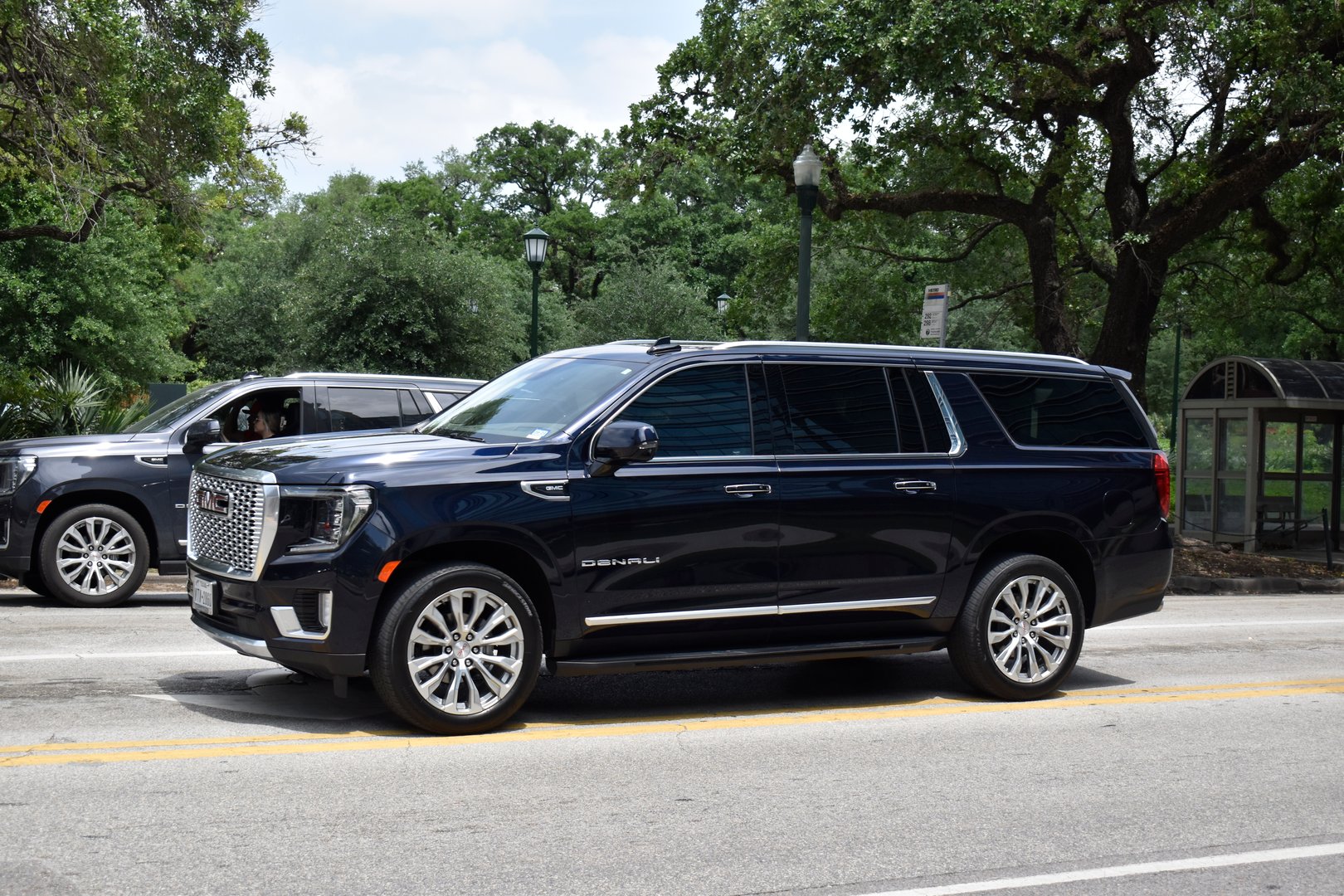 Luxury GMC Denali on scenic highway