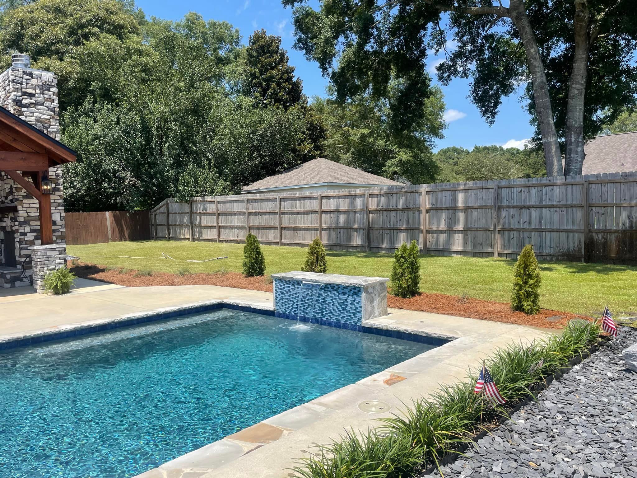 Professional landscaping equipment and crews