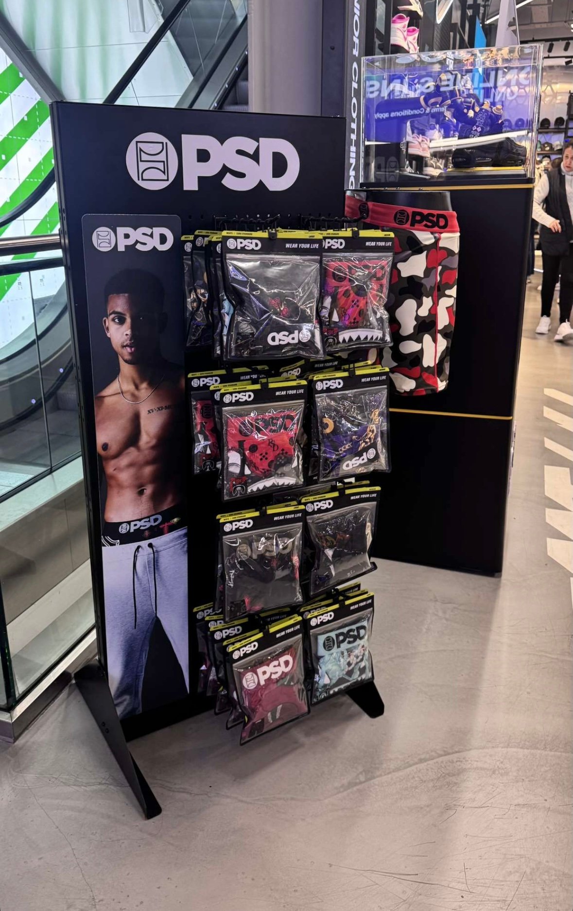 Underwear model showcasing PSD American brand, aesthetic physique-focused fashion campaign