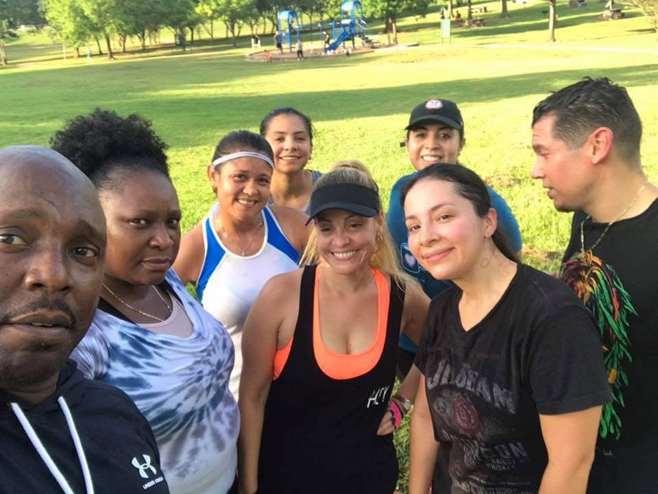 Woman exercising with dumbbell in gym