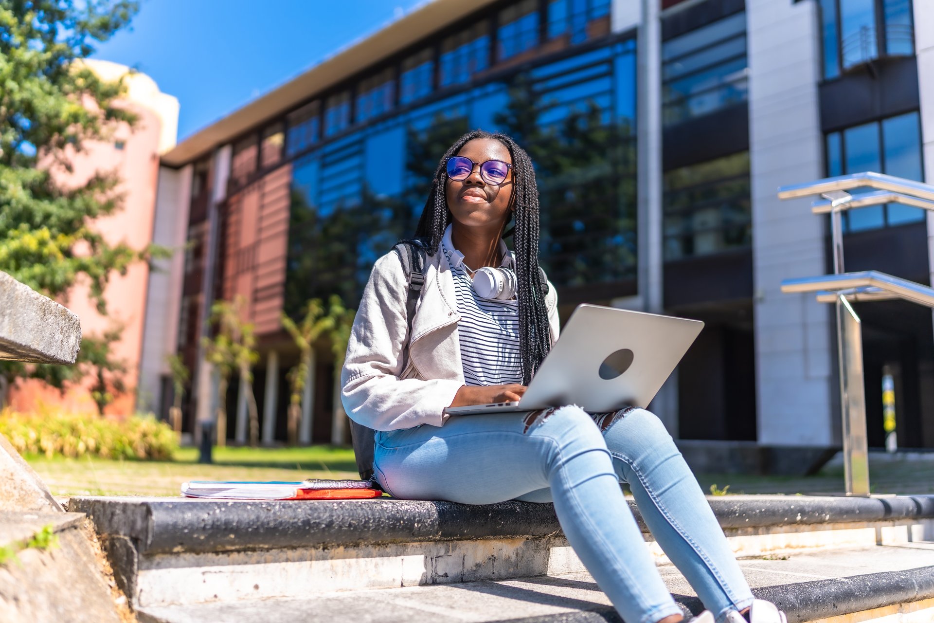 African woman using laptop for education and digital learning