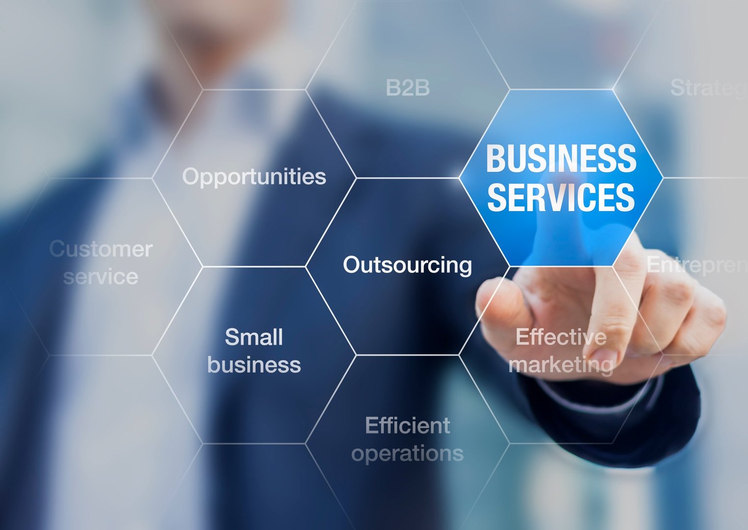Concept about business services sector with business-to-business relations and outsourcing, businessman in background