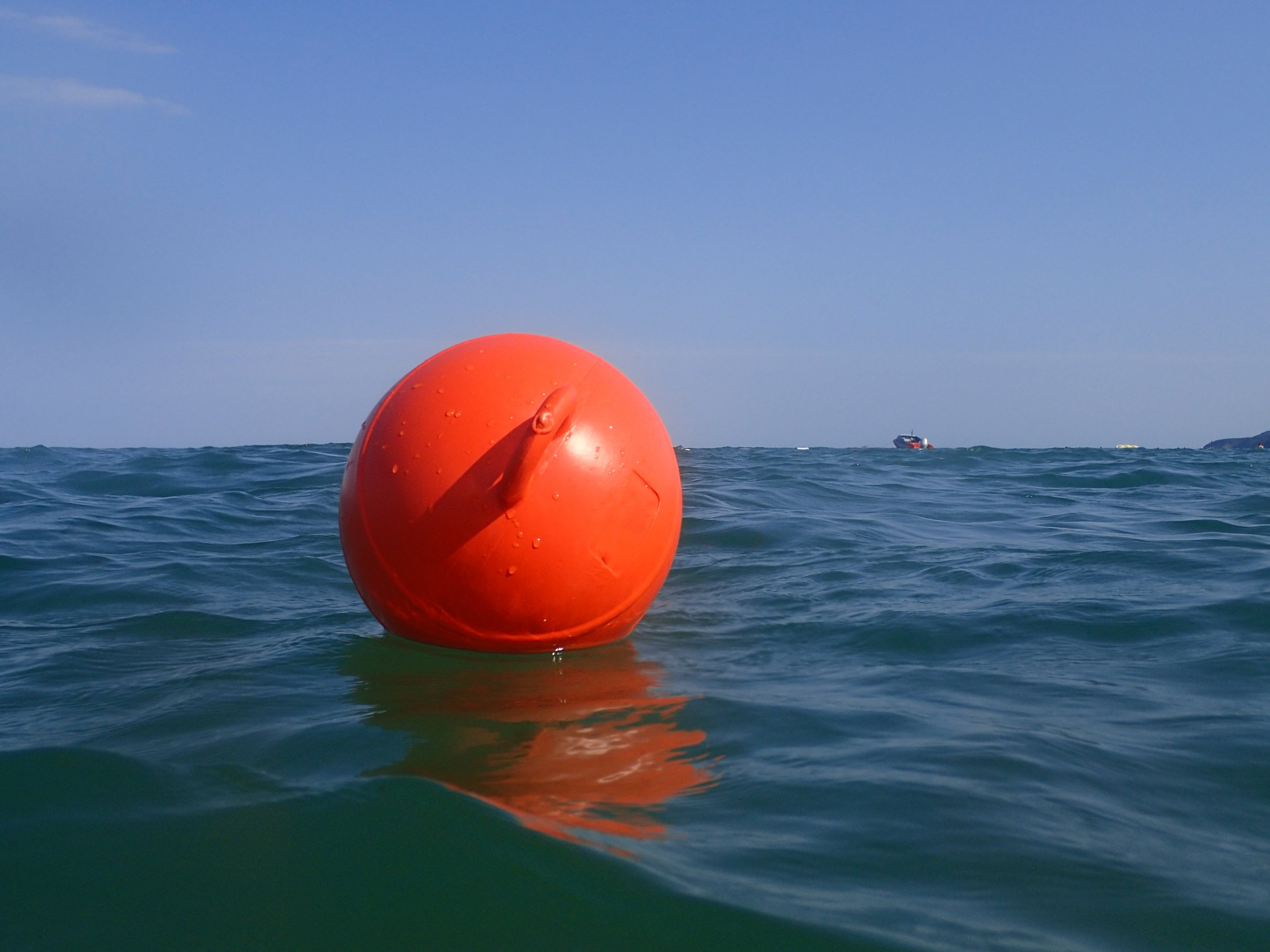 Red buoy floating in the sea in Obzor, Bulgaria