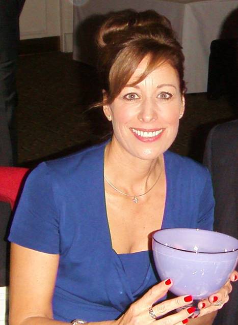 Marina Nicholas speaking at a professional event