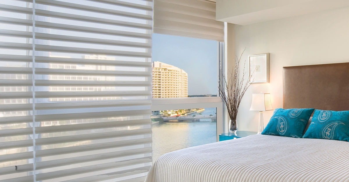 Custom Hunter Douglas blinds and window treatments installed in Pensacola Florida home by licensed interior designer