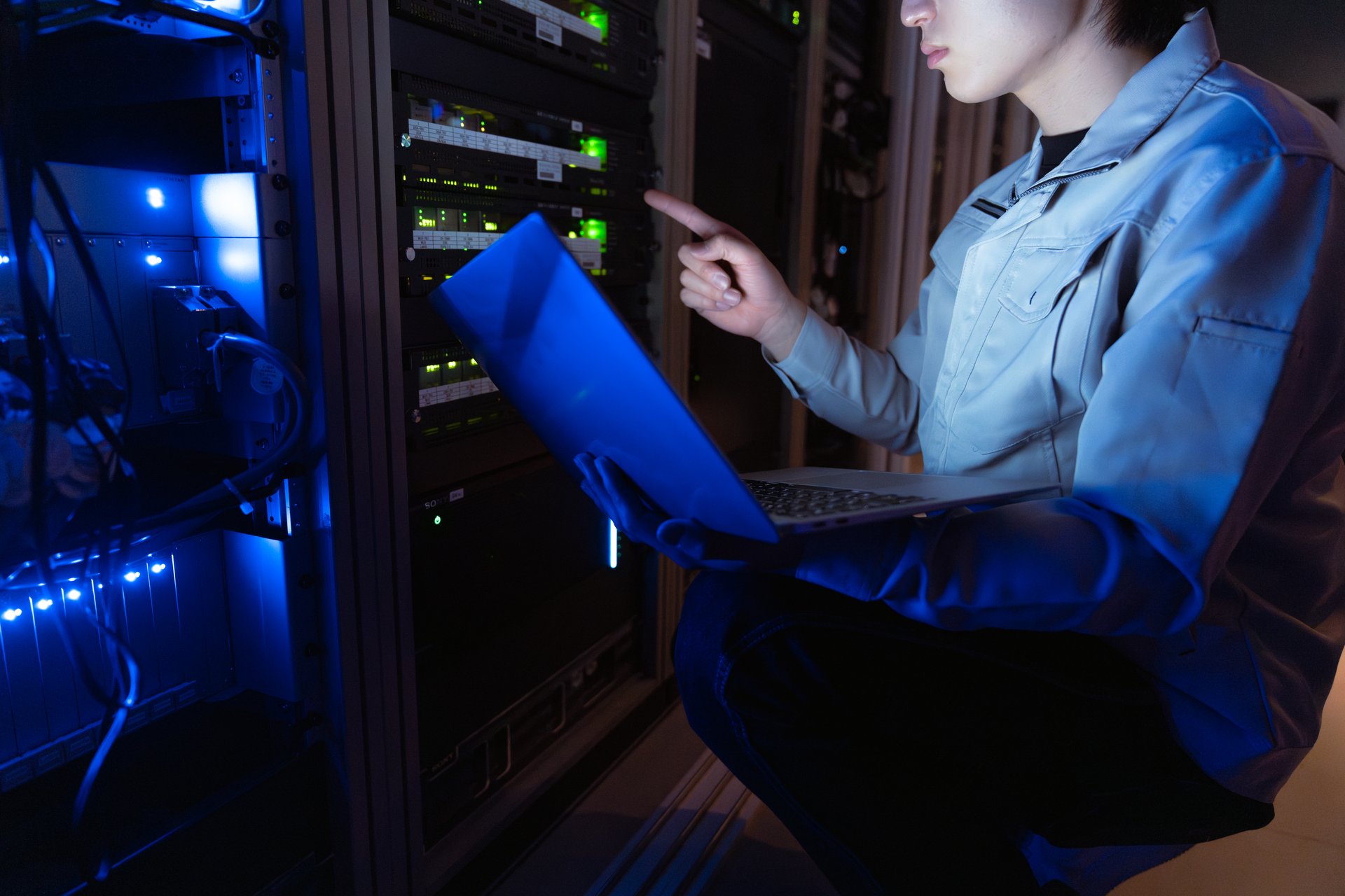 Technician working in server room