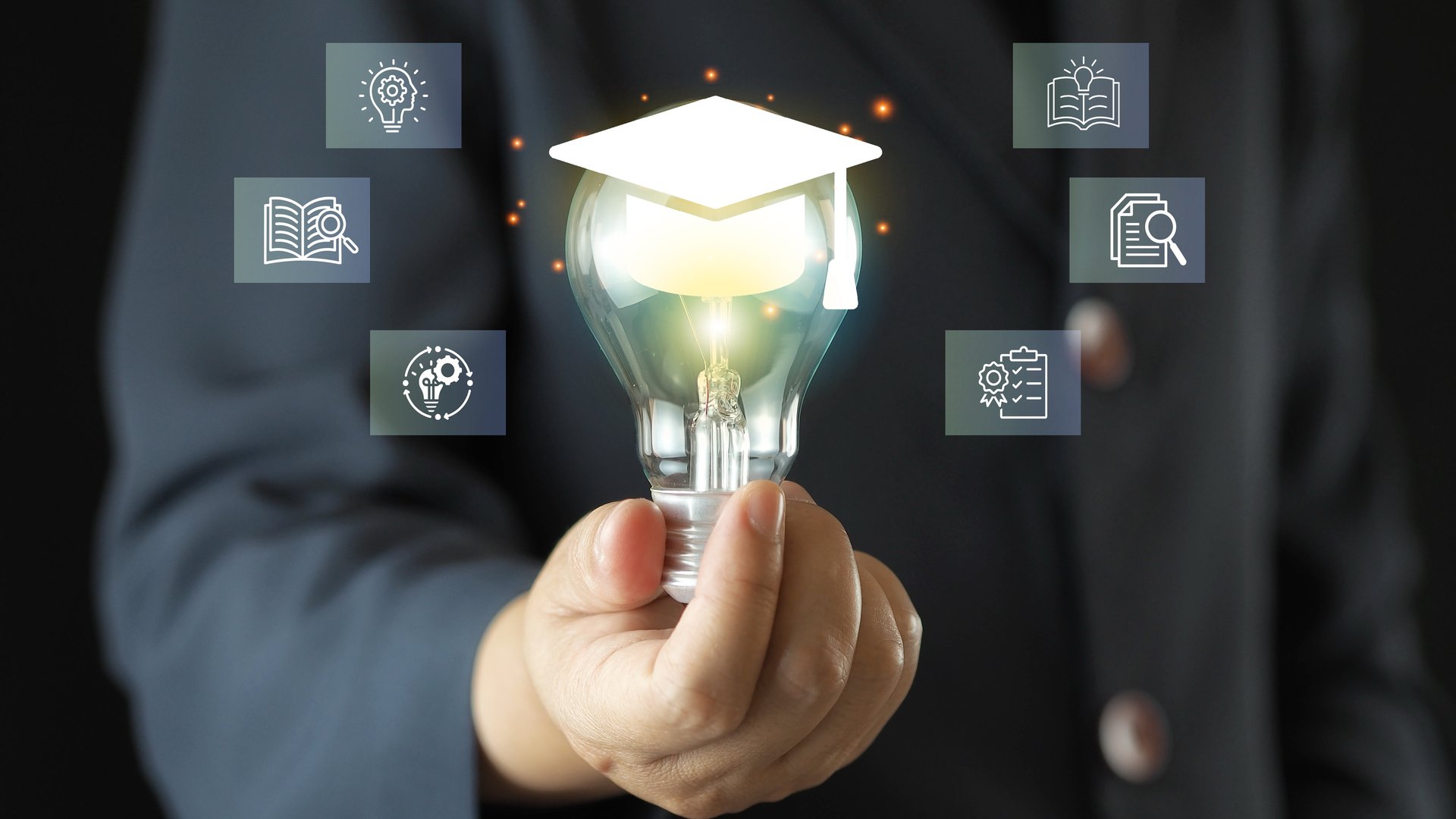 E-Learning-learning program for graduates  person with a light bulb symbolizing elearning, with icons education, online courses, and certification programs, the future of digital education.