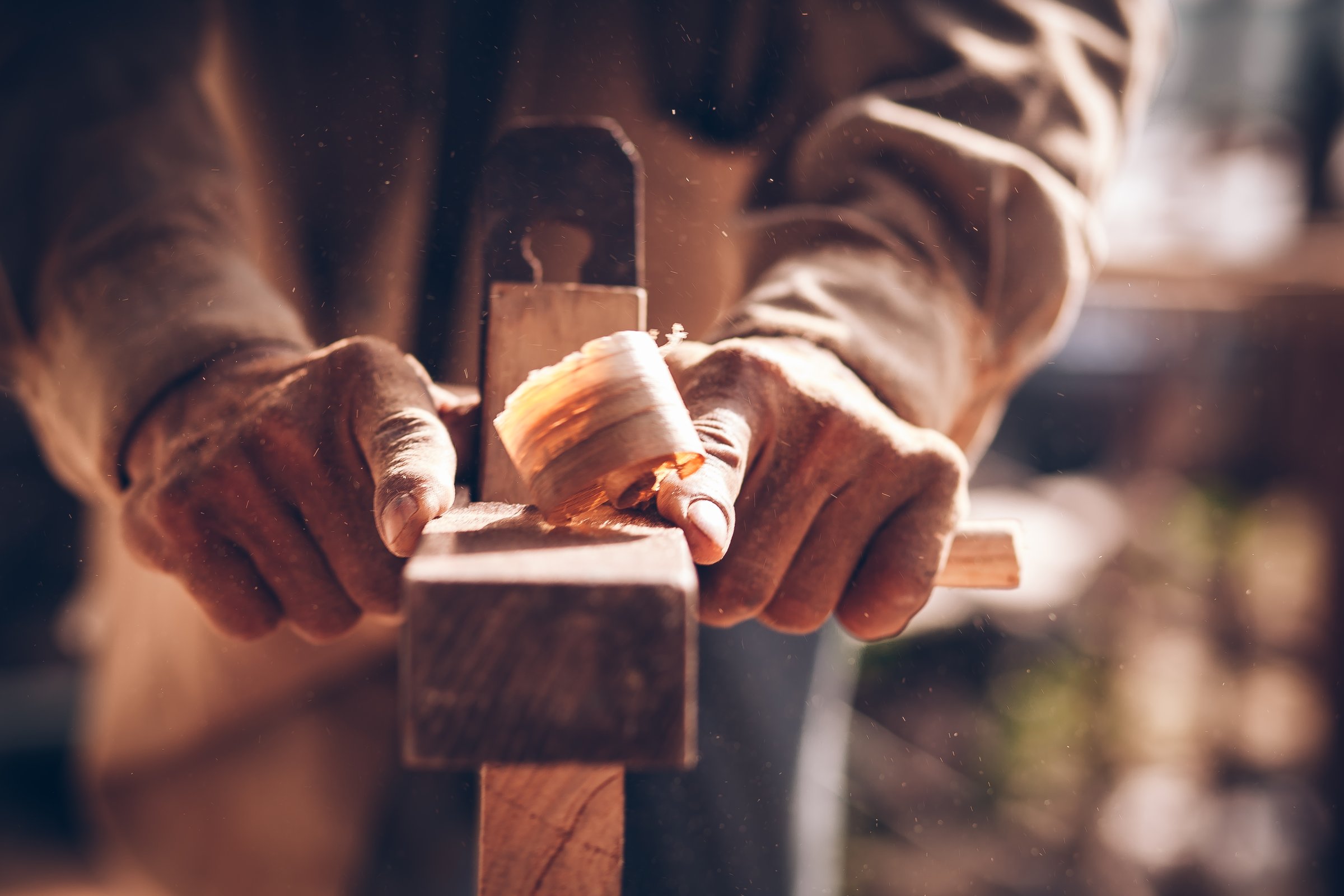 Close-Up Of Man Working With Machine