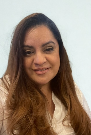 Mrs. Elly - Founder & Director