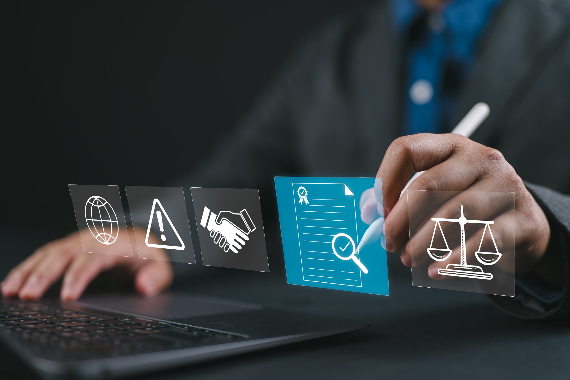 Compliance in business concept. Person use laptop with compliance icon on virtual screen, ensuring the enforcement of laws, regulations, and standards. Stay in line with business policies.