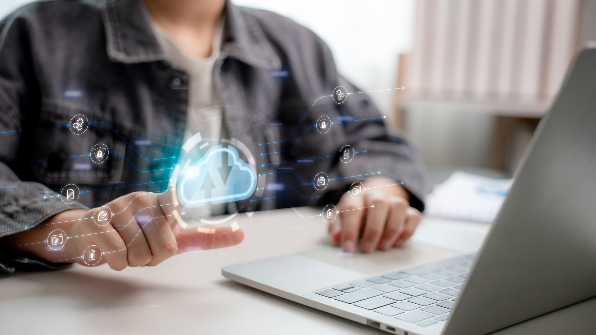 Cloud computing concept with digital data flow, user accessing storage via laptop. Modern technology for data management, network security, and smart online services.