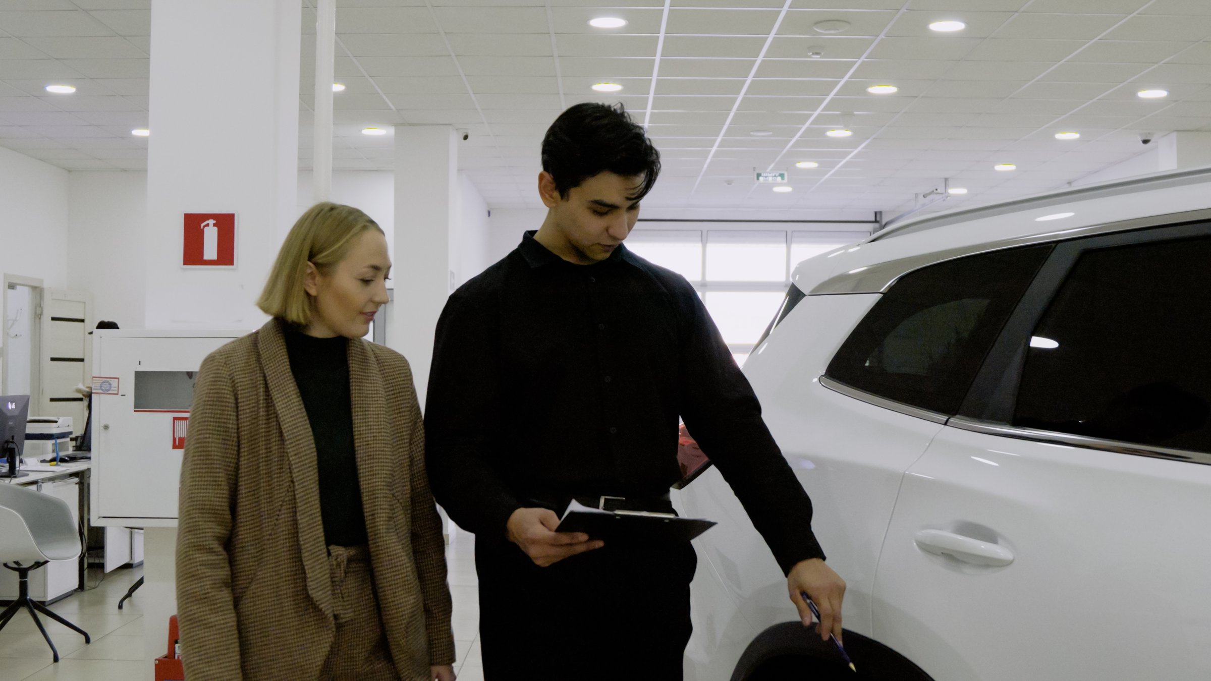 Luxury car in modern showroom