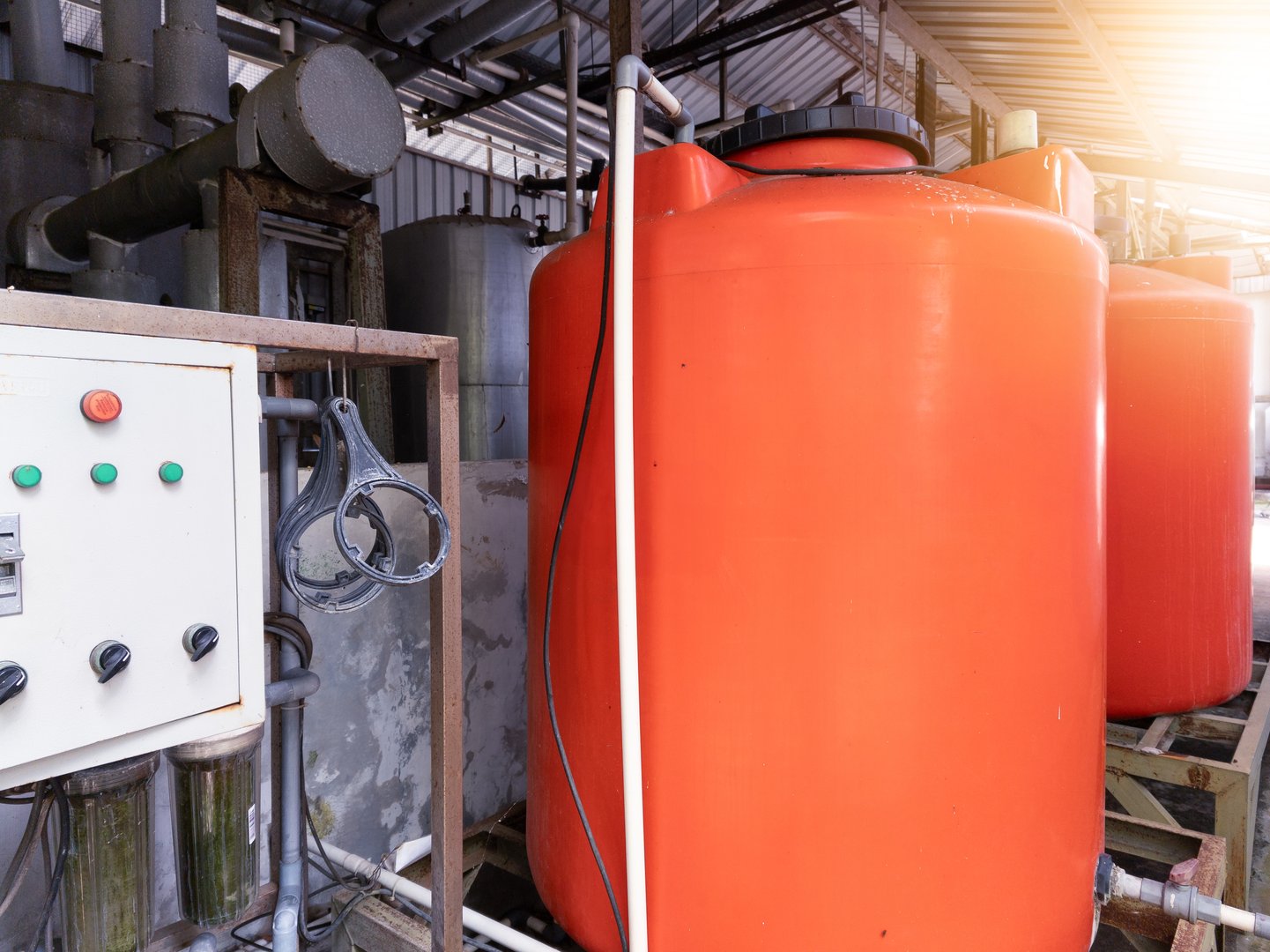 Orange torn for water treatment storage.