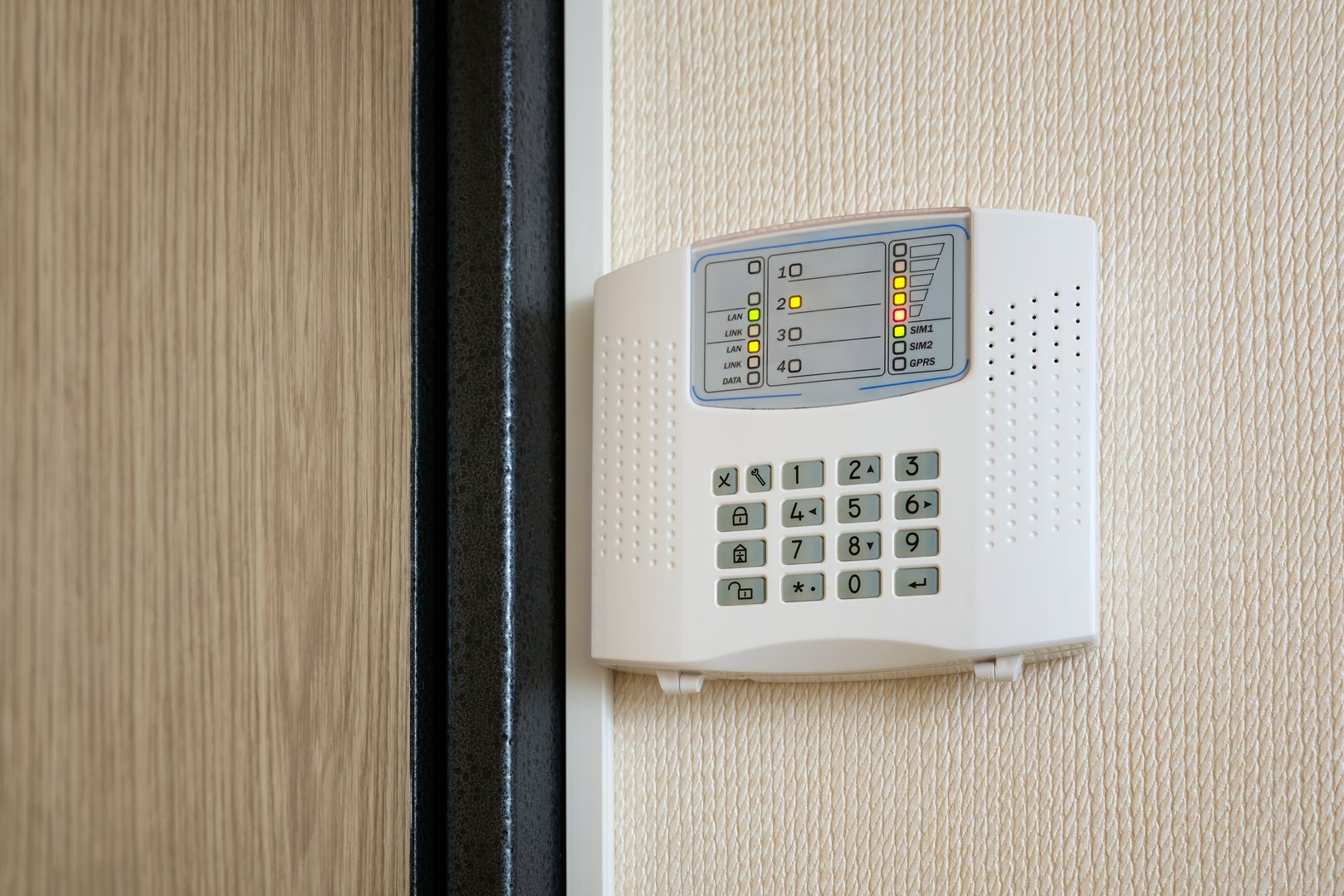 Security alarm control panel in an apartment or house. Security and protection of property in the modern world.