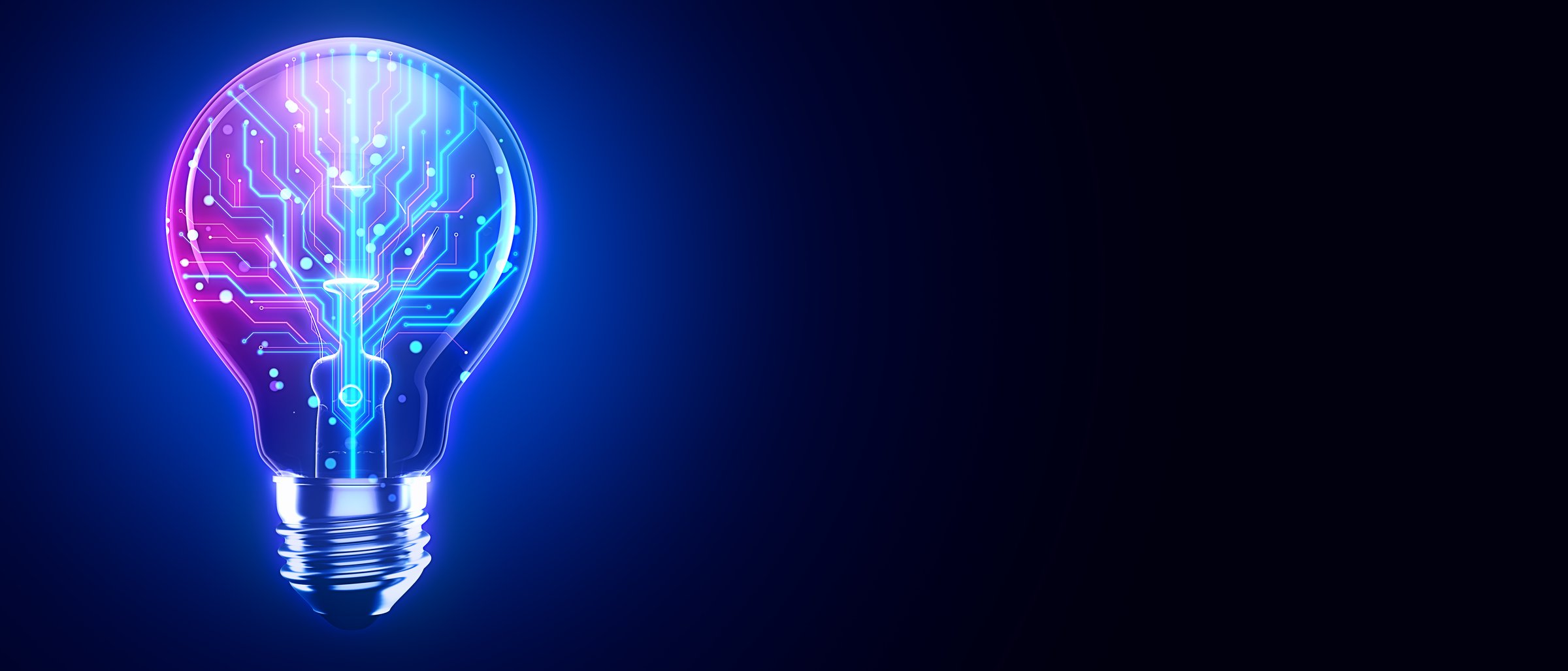 A glowing lightbulb with a circuit design inside, set against a dark blue background. Concept of technology, innovation, and digital transformation. 3D Rendering