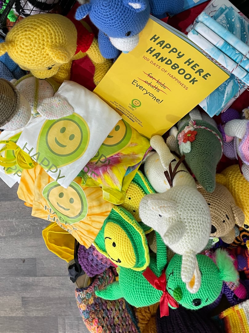 Happy Here merchandise and community