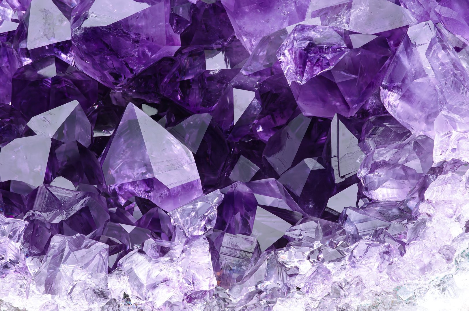 amethyst druse. macro detail texture background. close-up raw rough unpolished semi-precious gemstone