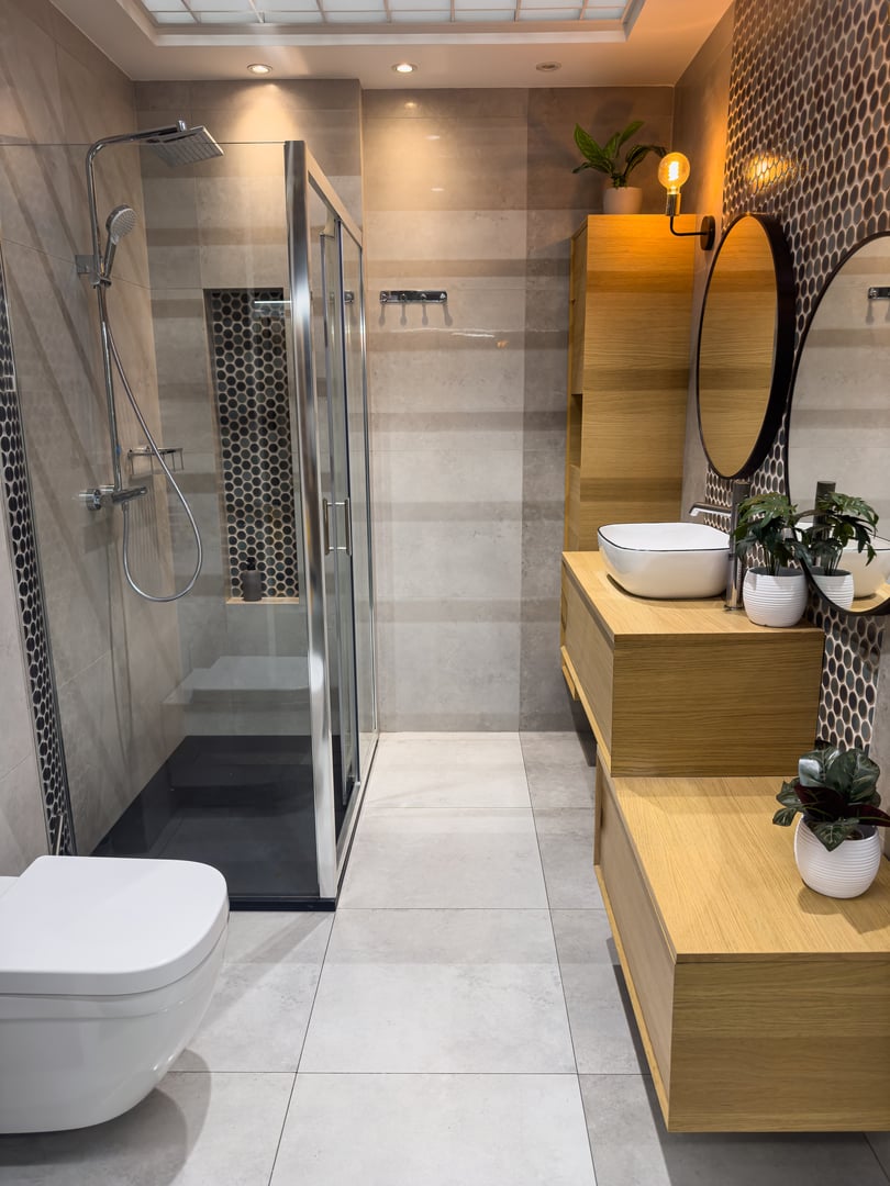 Stylish bathroom interior design with glass shower. Modern restroom at home