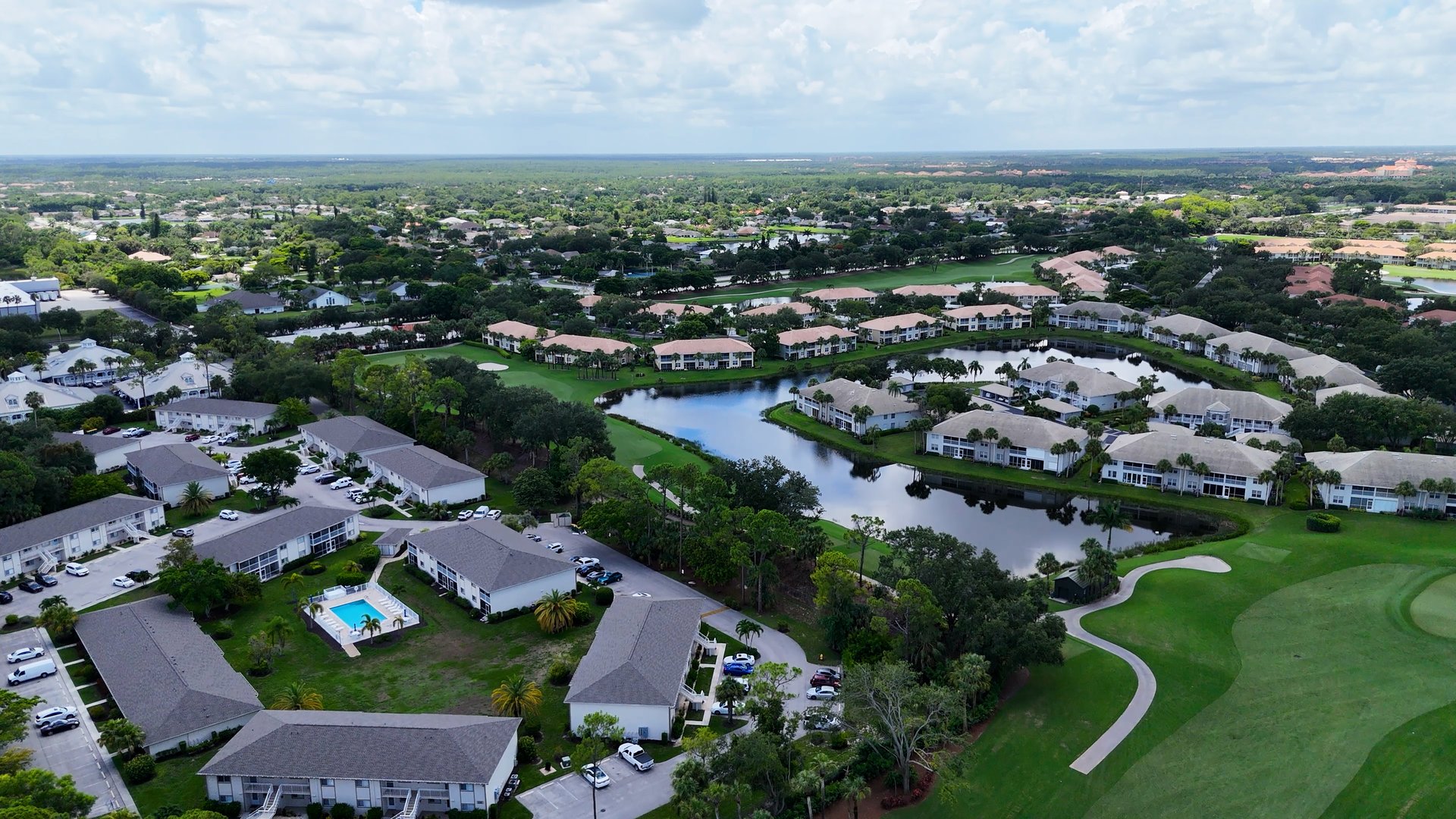 Aerial drone photo of Naples, Florida, capturing the beautiful golf course neighborhoods and houses lined up. Taken from above, drone photography of Fort Myers area in SWFL Southwest Florida