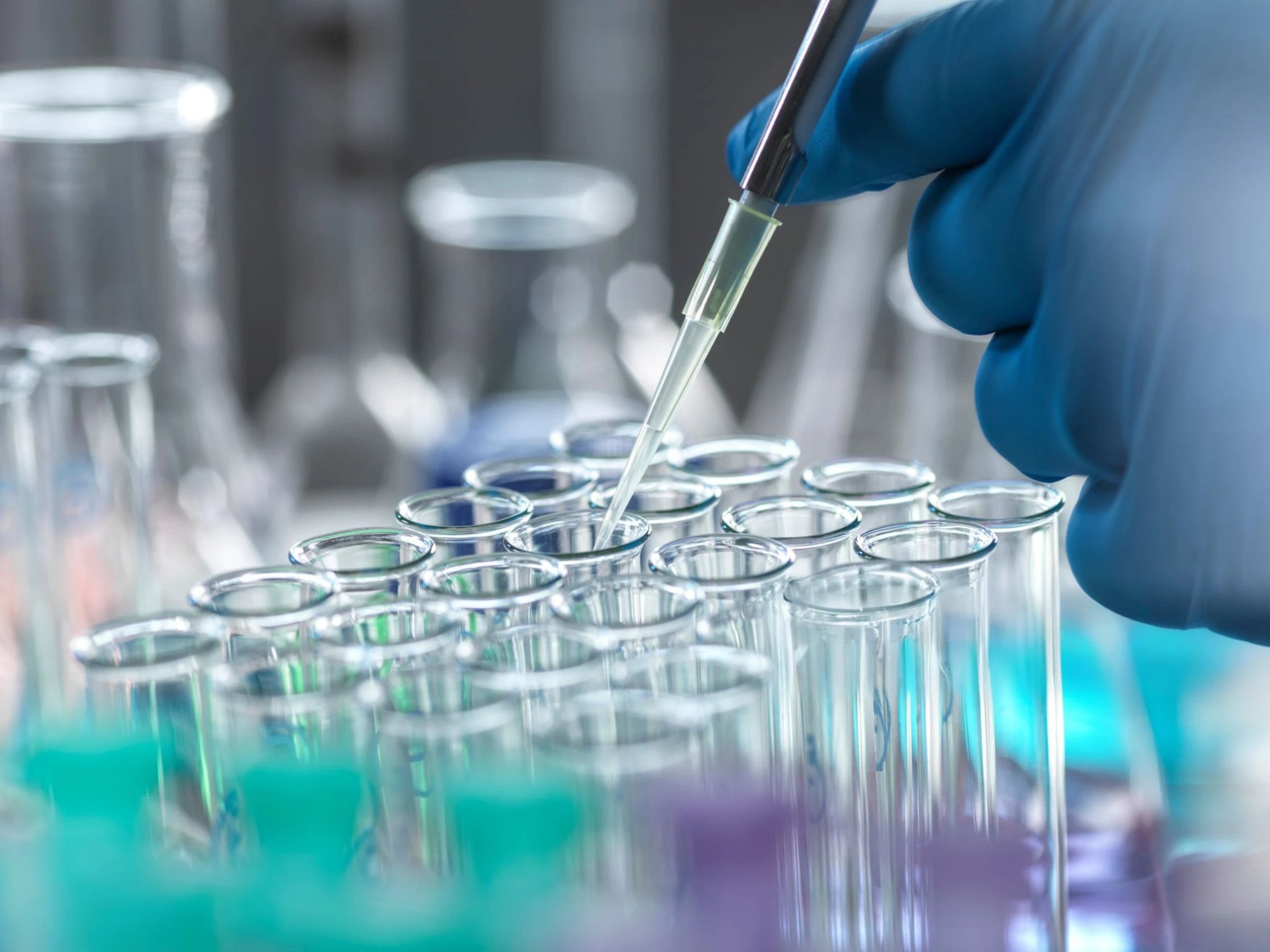 Laboratory testing with pipette and test tubes