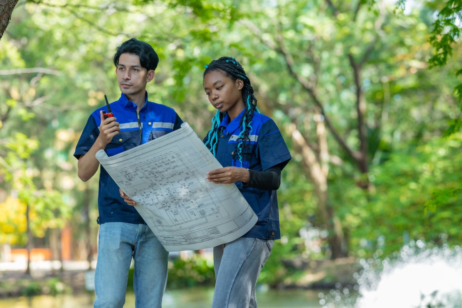 Mechanical engineers analyze blueprint, design paddlewheel aerator mechanism, motor, for efficient operation. Assessing oxygen levels, implementing aeration solutions for sustainable water ecosystems