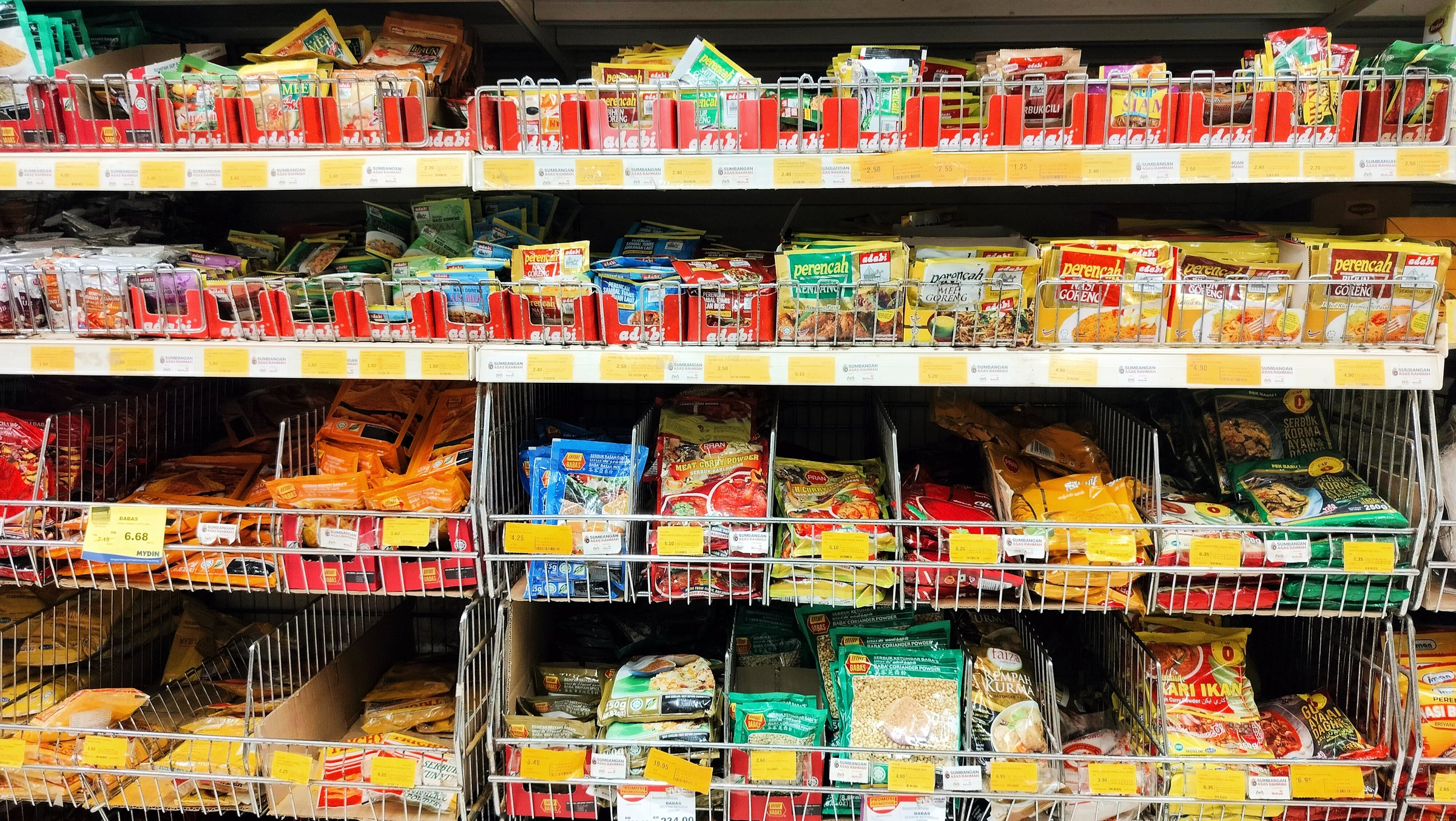 Malaysia Kuala Terengganu 3 October 2025 : The spices are sold in commercial packages and are displayed on shelves in the supermarket. common spices that make cooking delicious