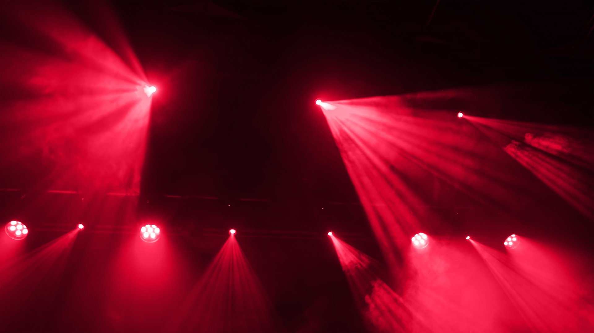 Abstract red stage lights with smoke effect
