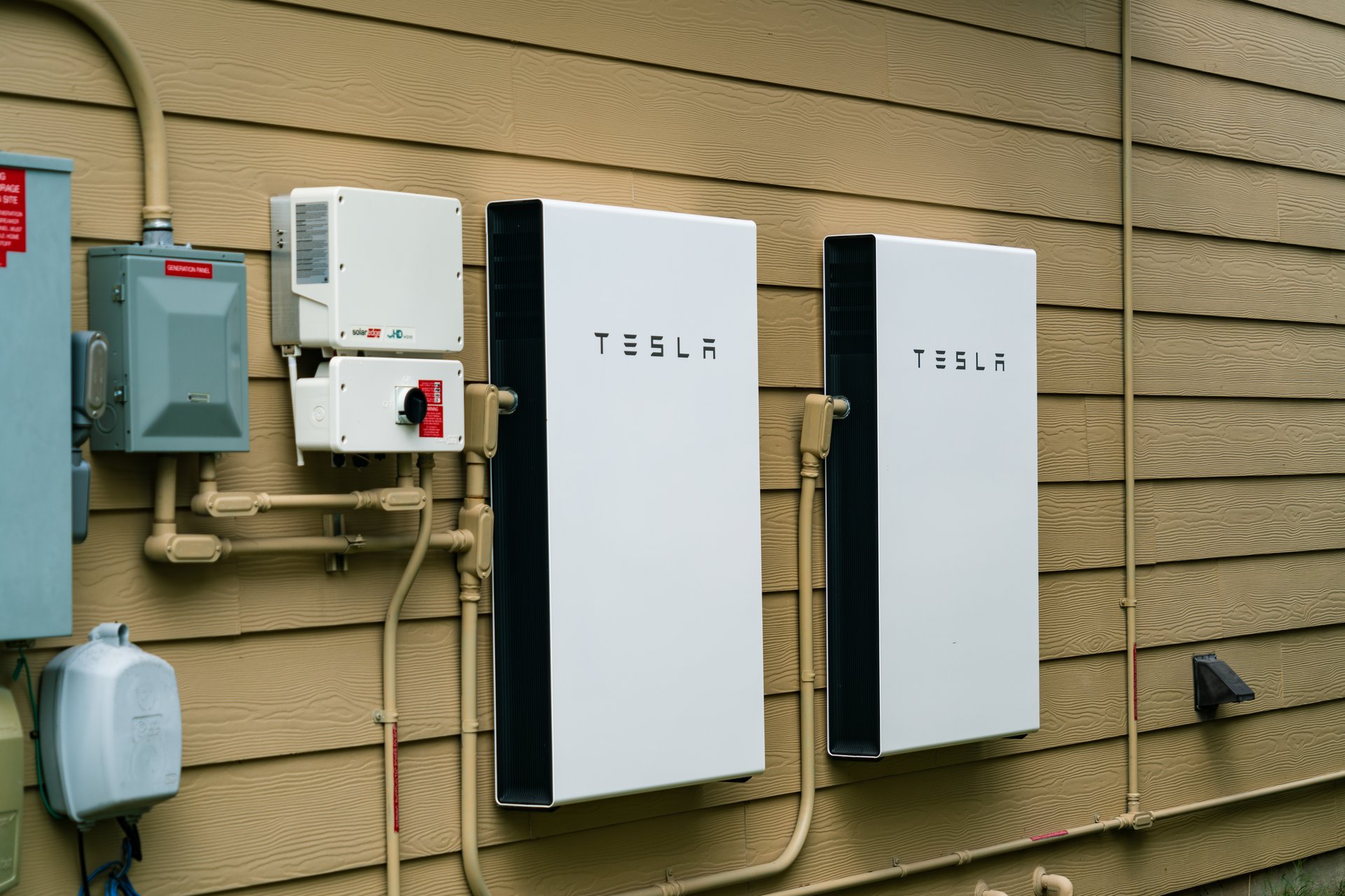 Tesla Powerwall home energy storage can provide grid level stability when enough homes in a neighborhood have Tesla Solar and Battery storage
