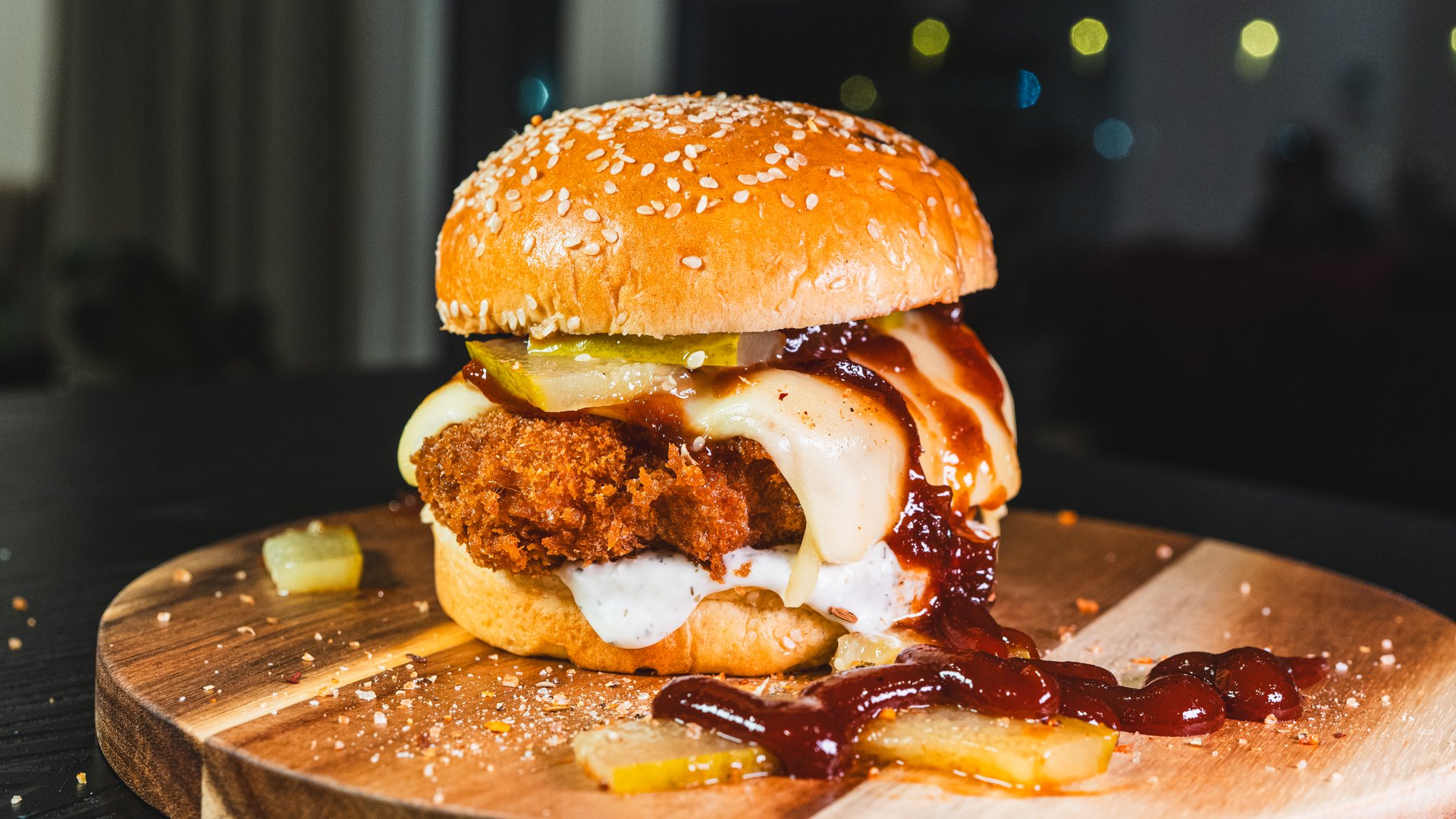 Korean fried chicken katsu burger with panko-crusted thigh, brioche bun, special sauces, pickles, and cheese. Crispy, juicy, and packed with flavor. Asian fusion delight.