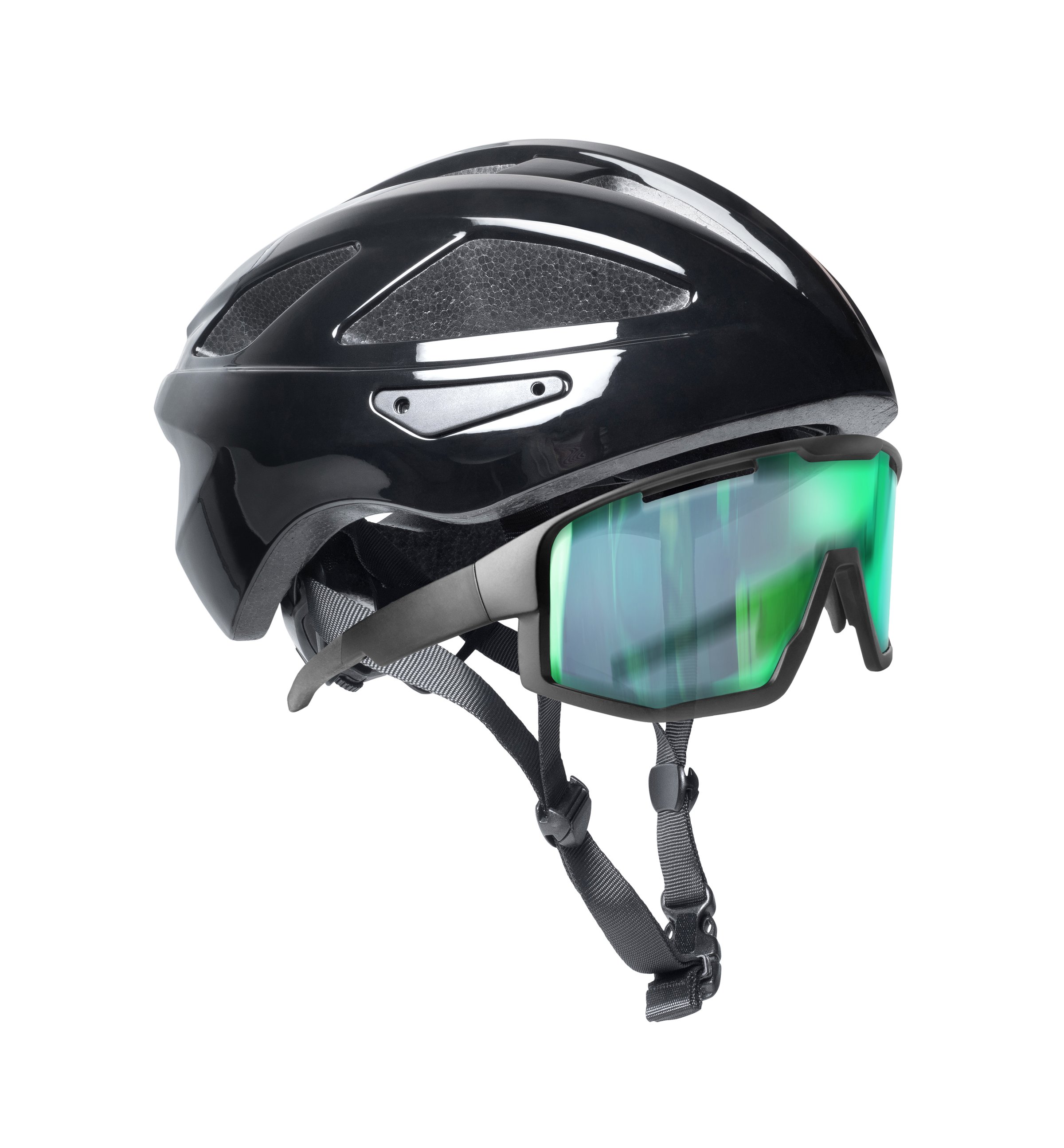 Black bicycle helmet with sports glasses close up isolated on a white background