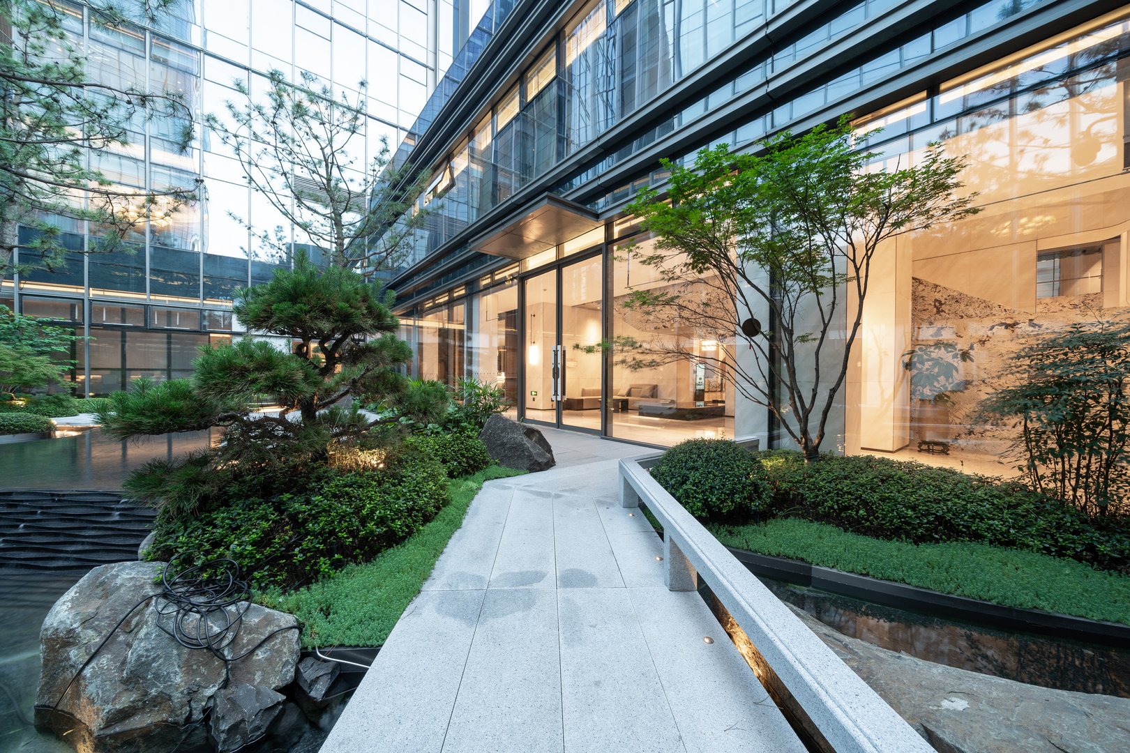 footpath through garden in yard of modern building