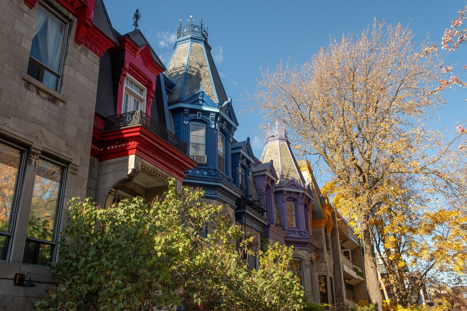 Montreal, Canada : Colorful Victorian house facades with outdoor staircases in the Plateau-Mont-Royal neighborhood
