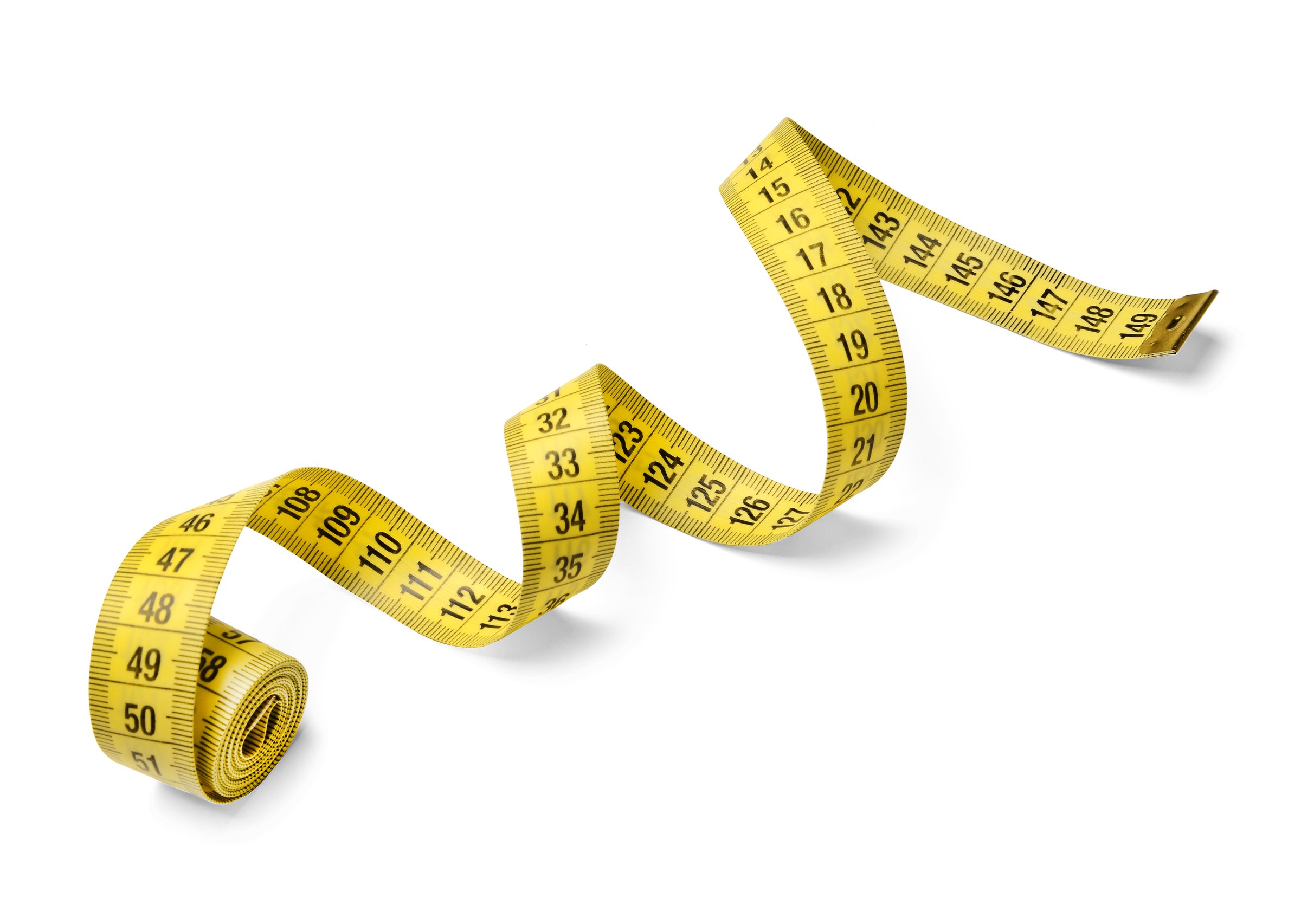 Centimeter tailor's tape on a white isolated background. White isolated background. Diagonal. Close-up.