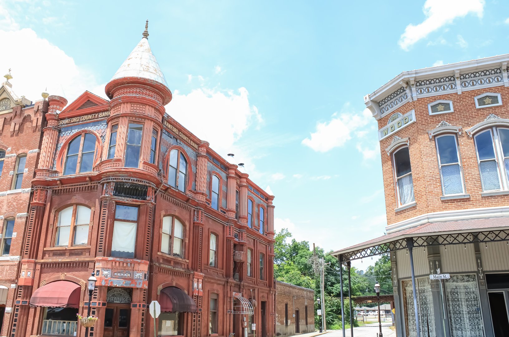 A view of the historic architecture of Van Buren, Arkansas on a sunny afternoon