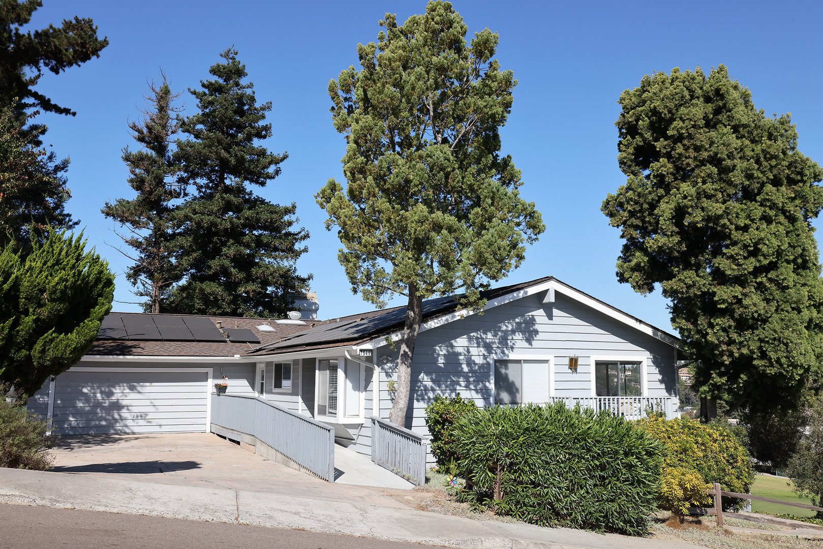 Coastal Comforts Assisted Living exterior with beautiful landscaping