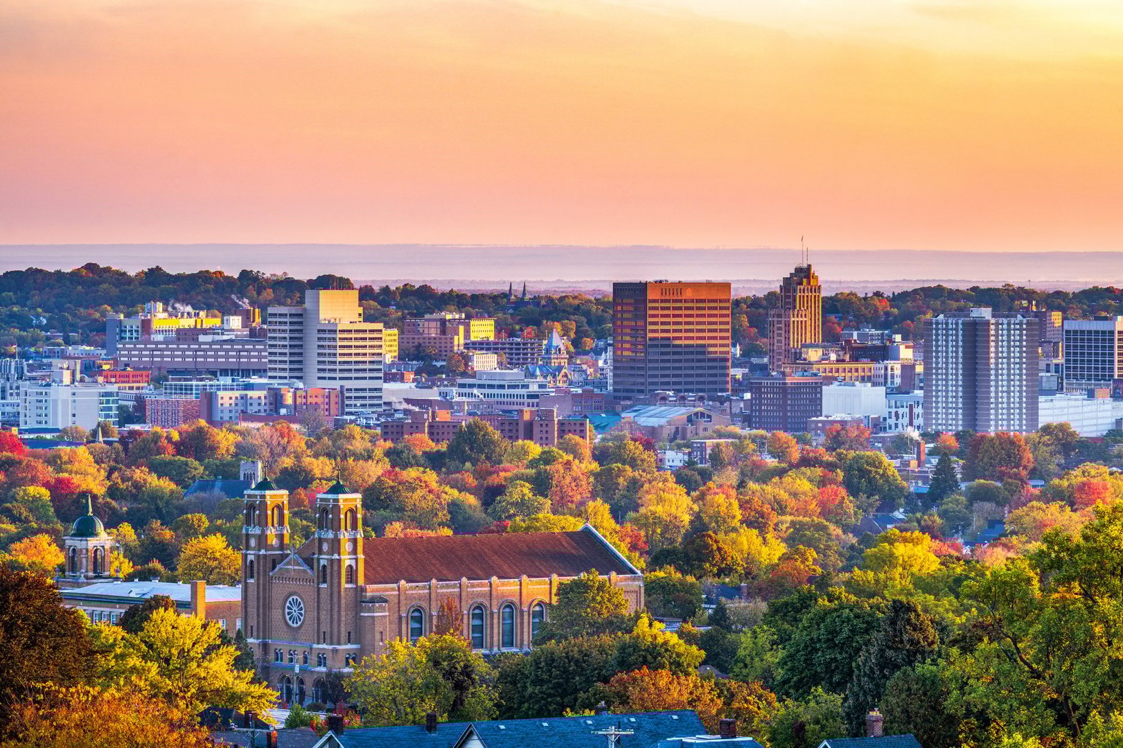 Syracuse, New York, USA downtown cityscape in autumn at dawn.