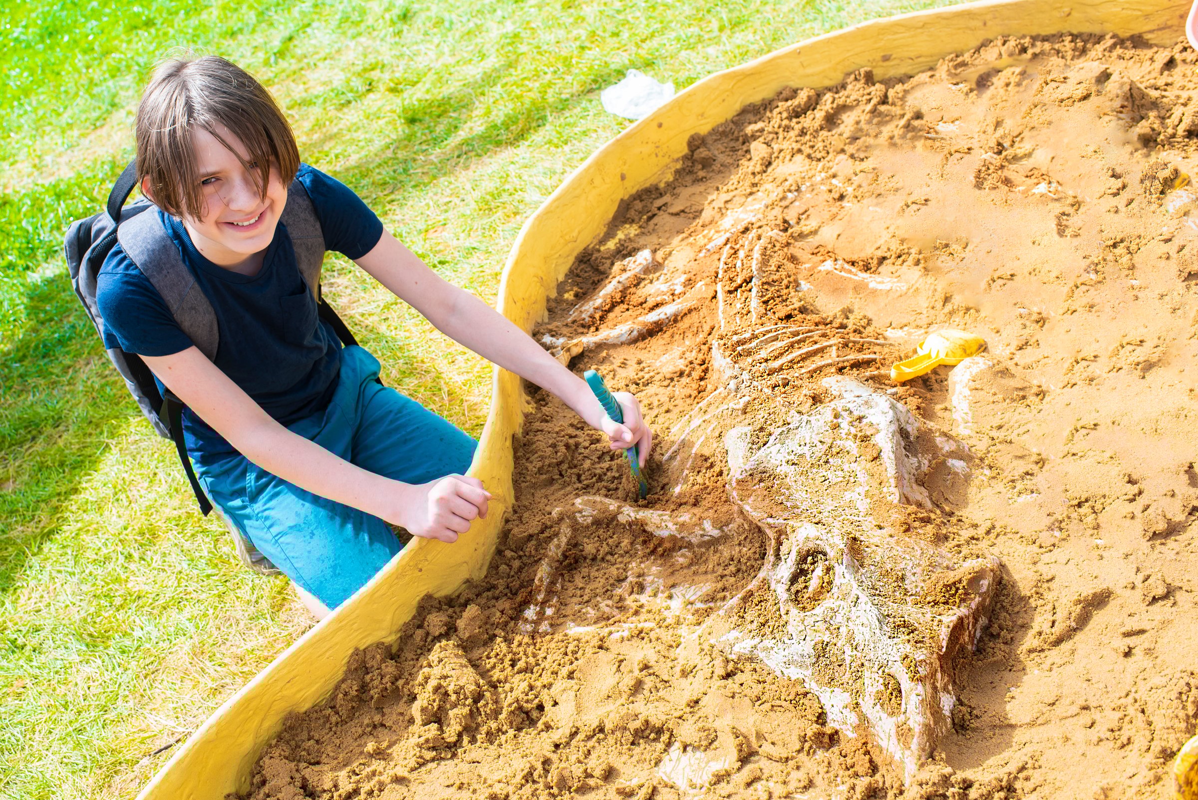 Kids digging for bones