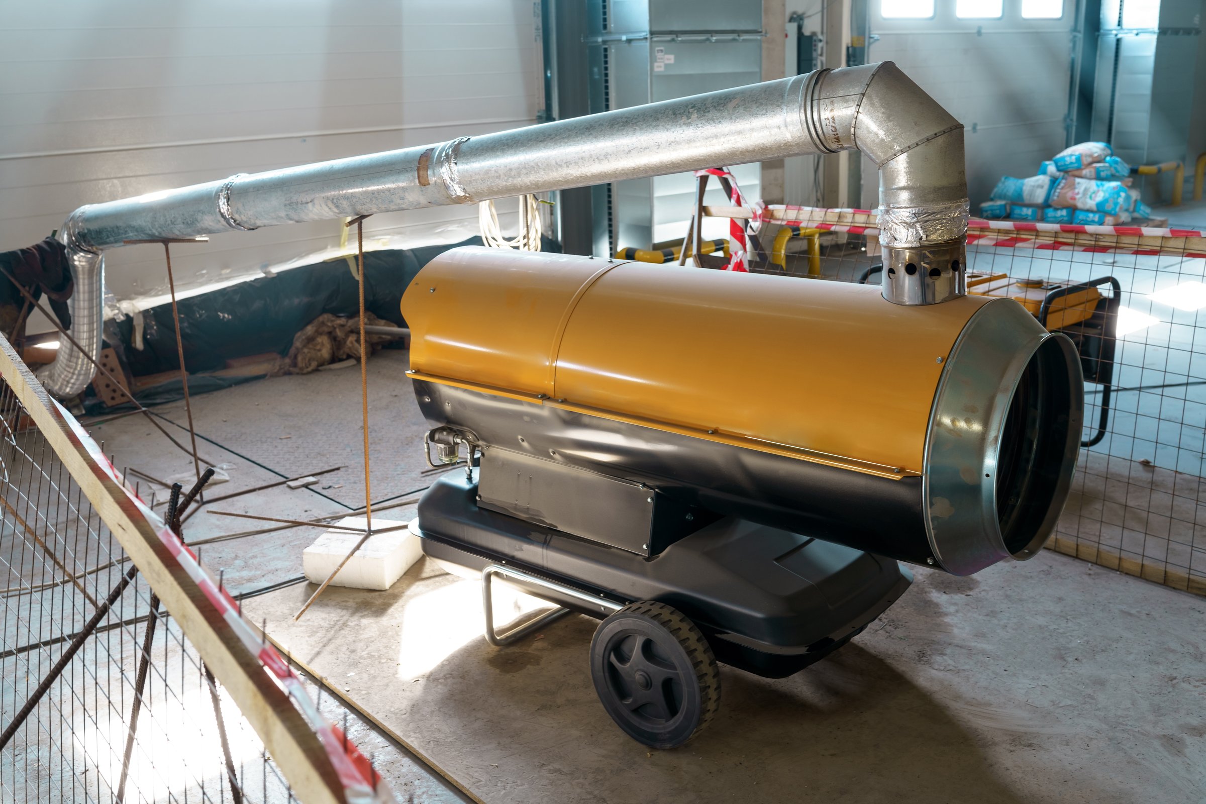 Diesel heat gun indirect heating on the construction site. Thermal equipment for building heating