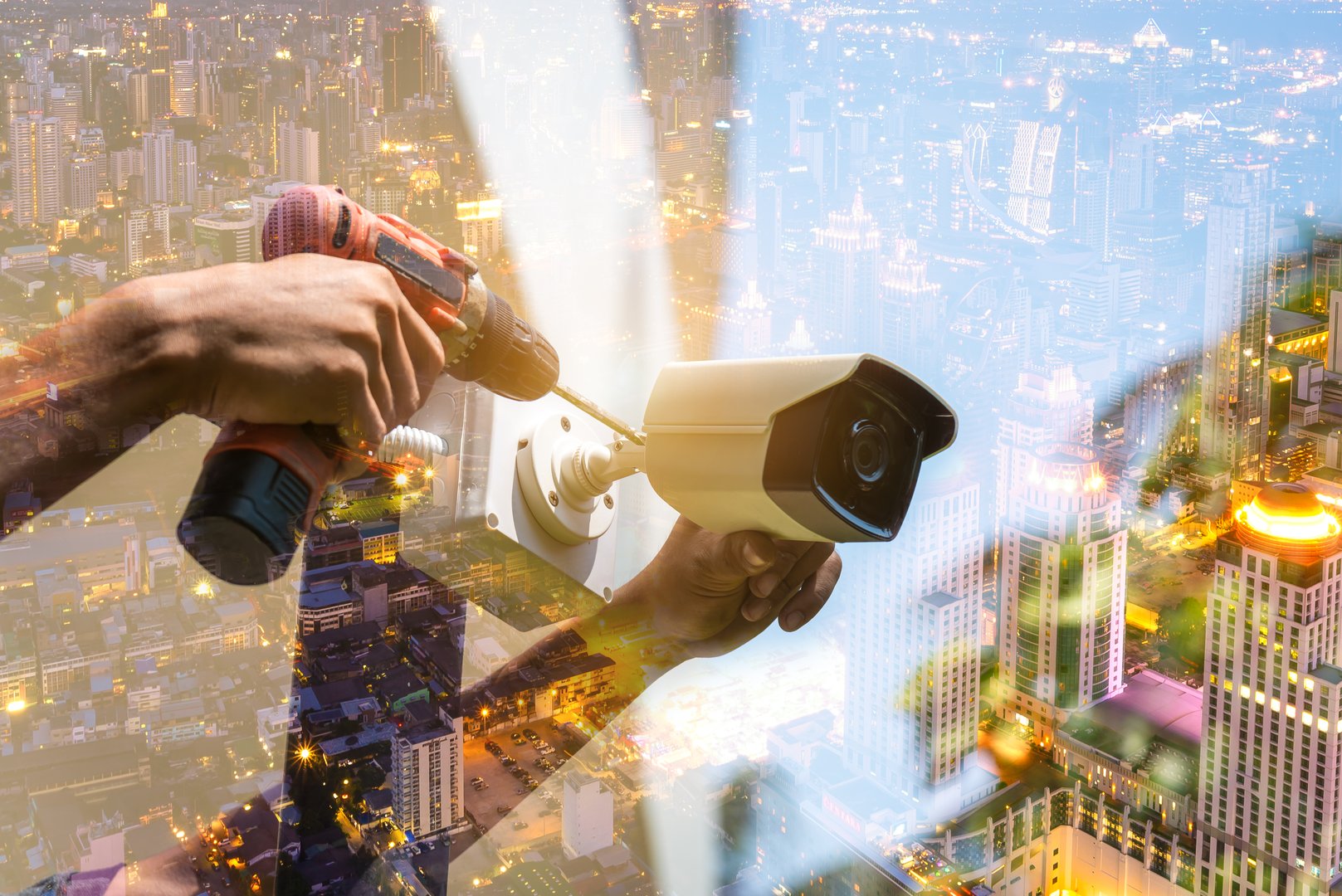 Double exposure technician installation CCTV camera on a pole , show signal , blurred background with an infographics city building landscape.