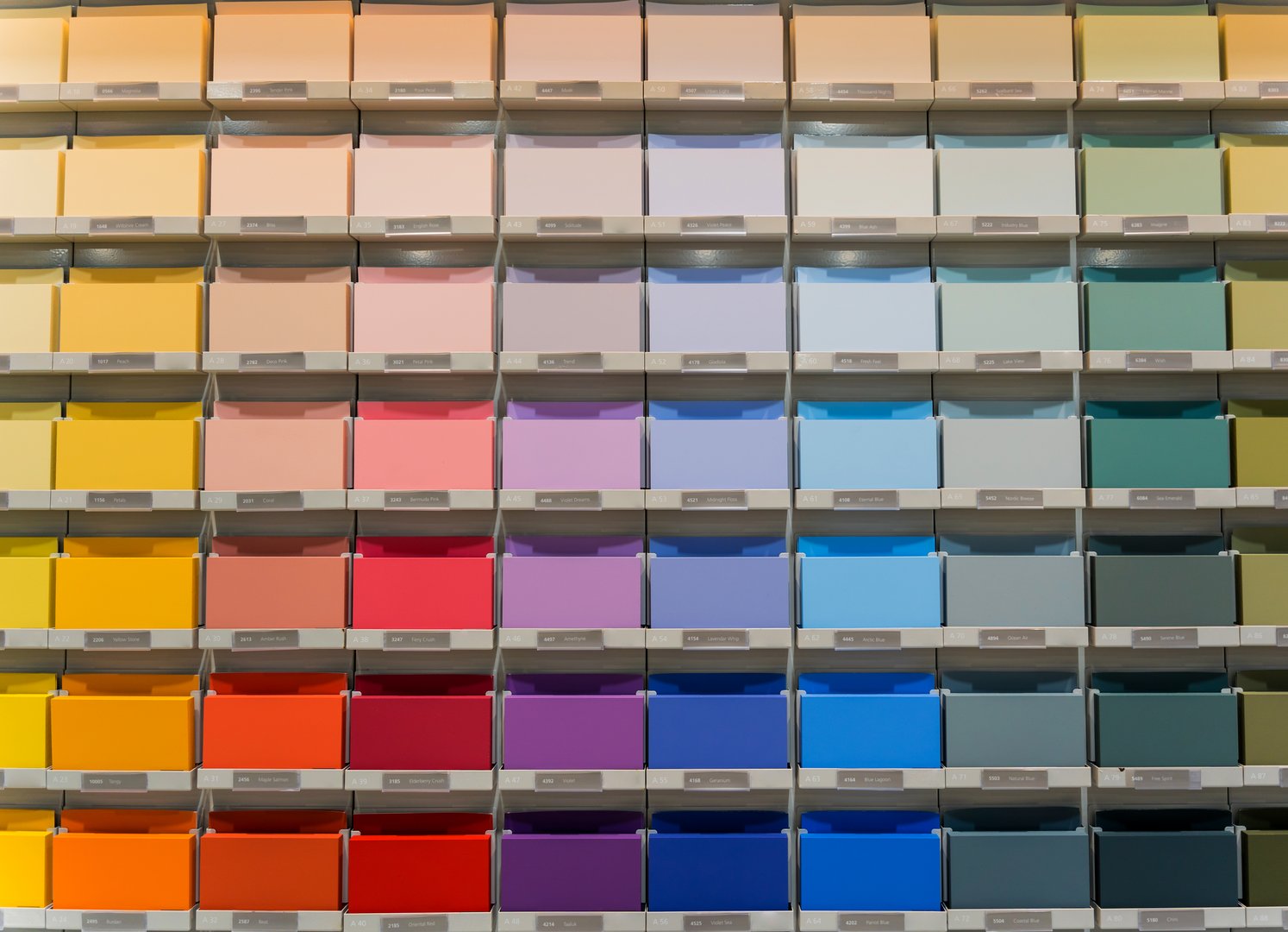 Stand of paint samples for wall painting at the shop.
