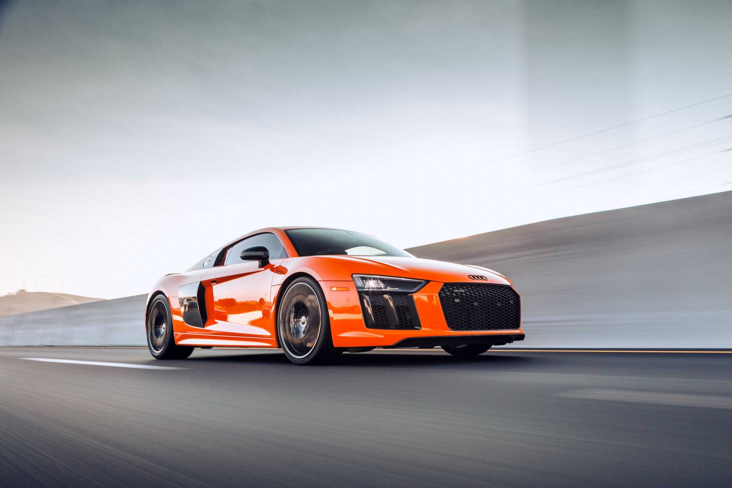 San Fran, CA, USAOctober 11, 2020Orange Audi R8 driving on the highway