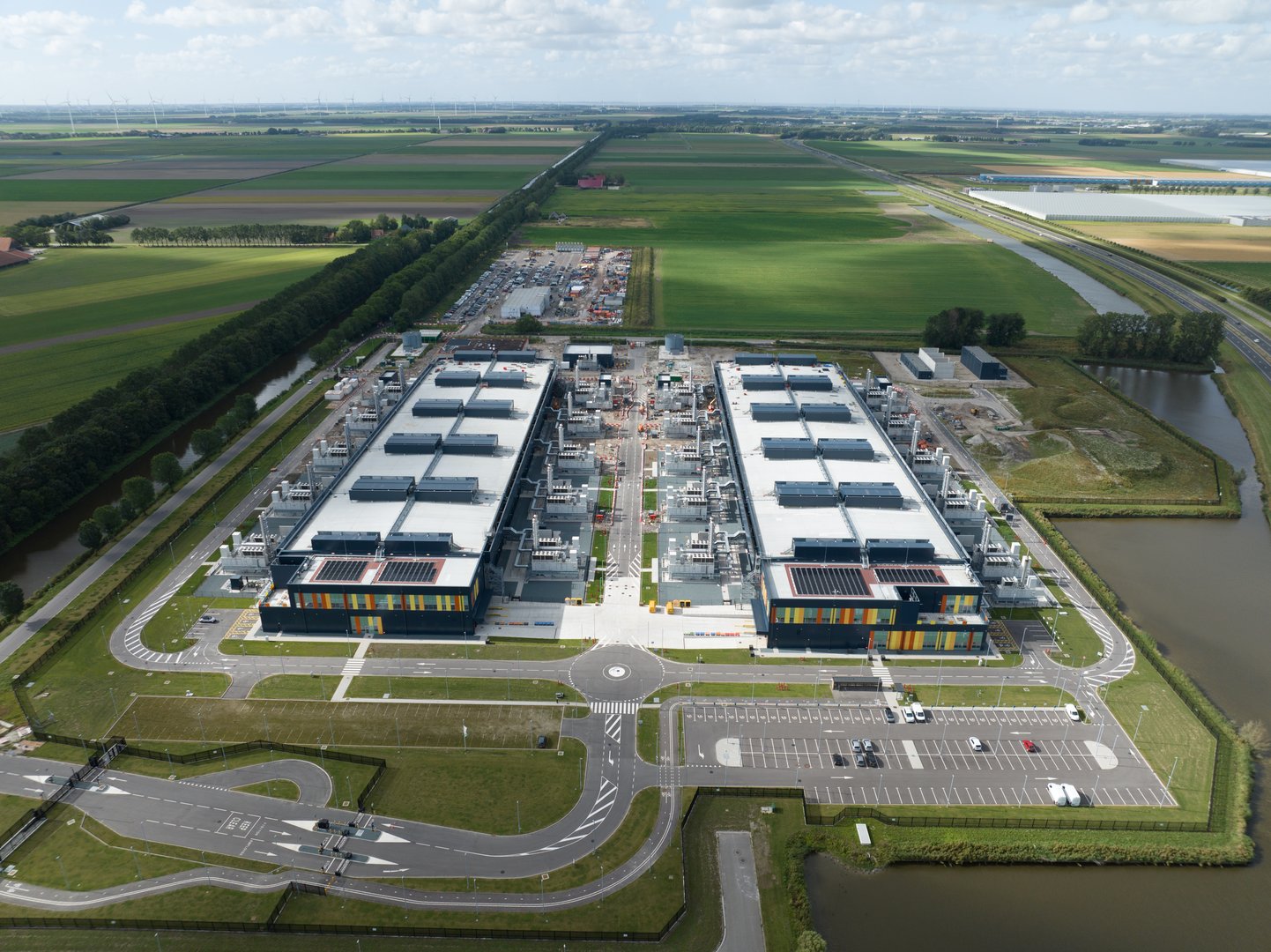 Data center, cloud storage infrastructure, big data housing in The Netherlands. Aerial drone view.