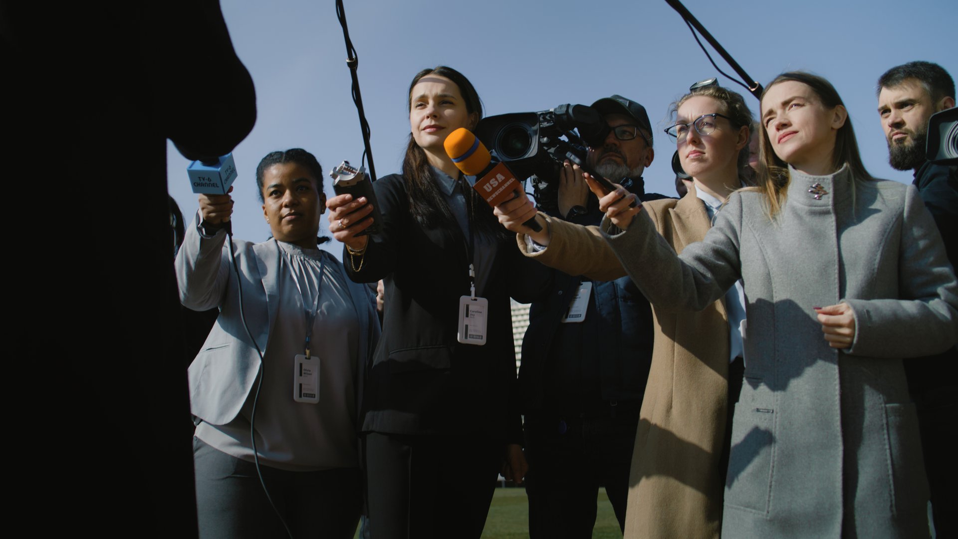 Interview of private investor at press conference for TV news. SEO or director of football team answering press questions and giving interview before match. Inspirational speech on press conference.