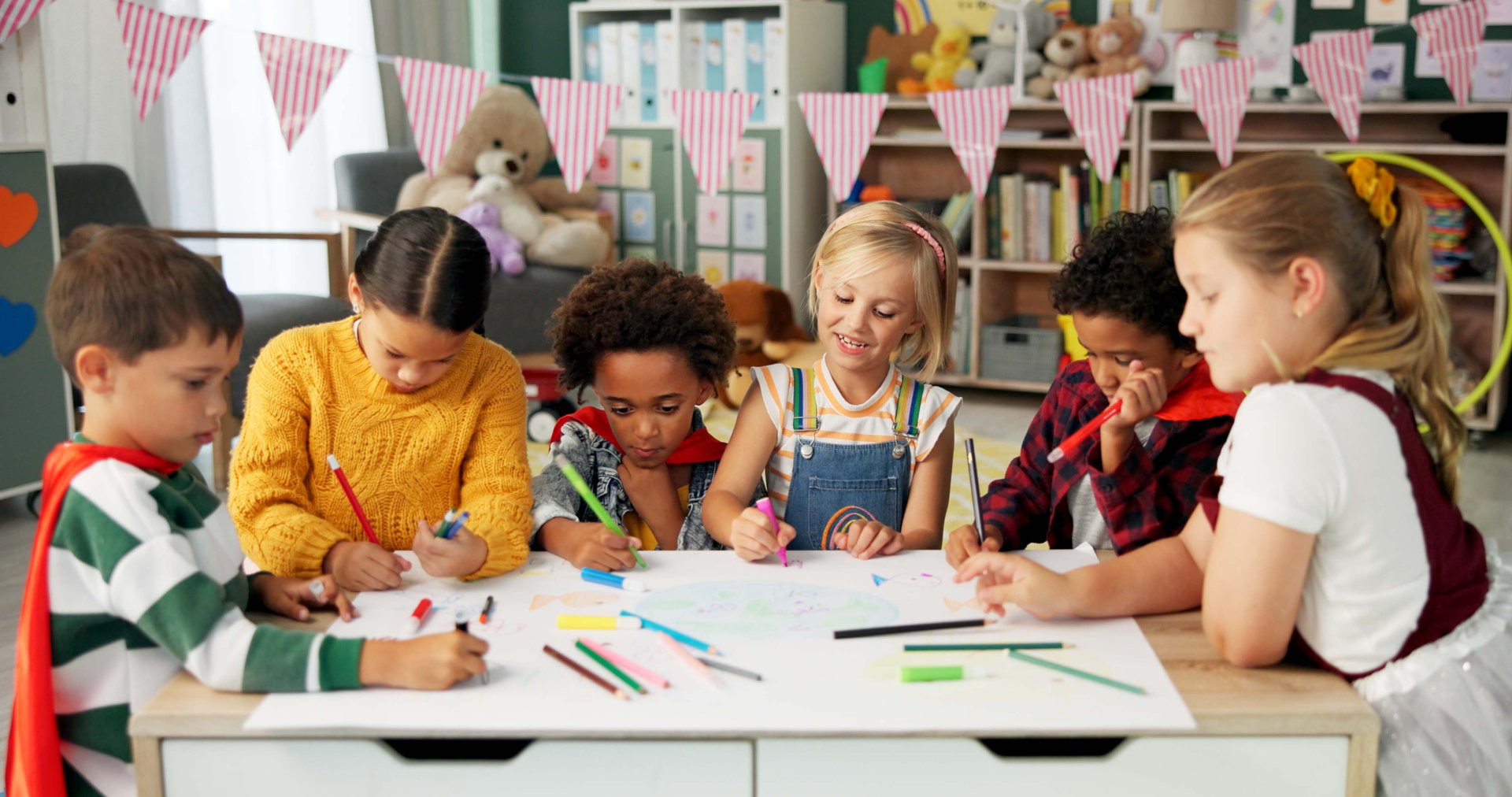 Children drawing in classroom