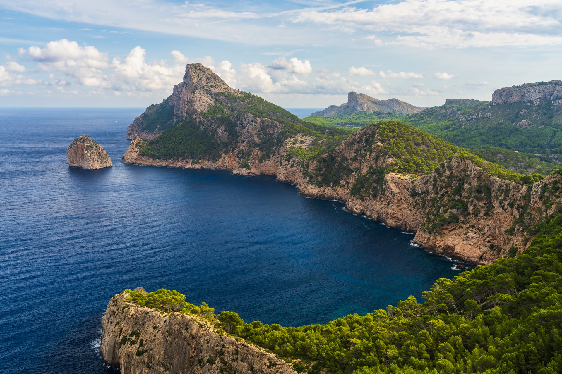 Breathtaking coastal landscape of Cape Formentor on Mallorca, Spain. Rocky cliffs, blue sea, dramatic skies make it a perfect Mediterranean travel destination.