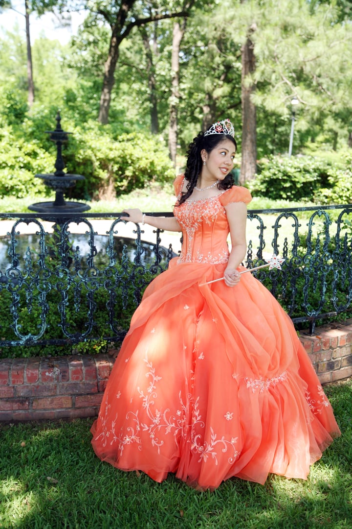Young teen wearing a beautiful gown on her 15th birthday.