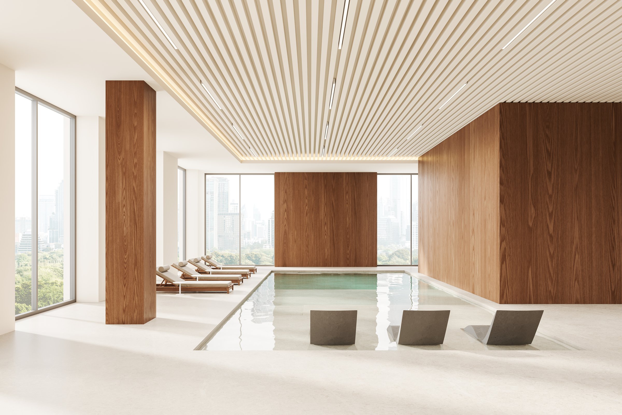 Beige and wooden spa interior with loungers in row, swimming pool and panoramic window on Bangkok skyscrapers. Luxury hotel design and relax space. 3D rendering