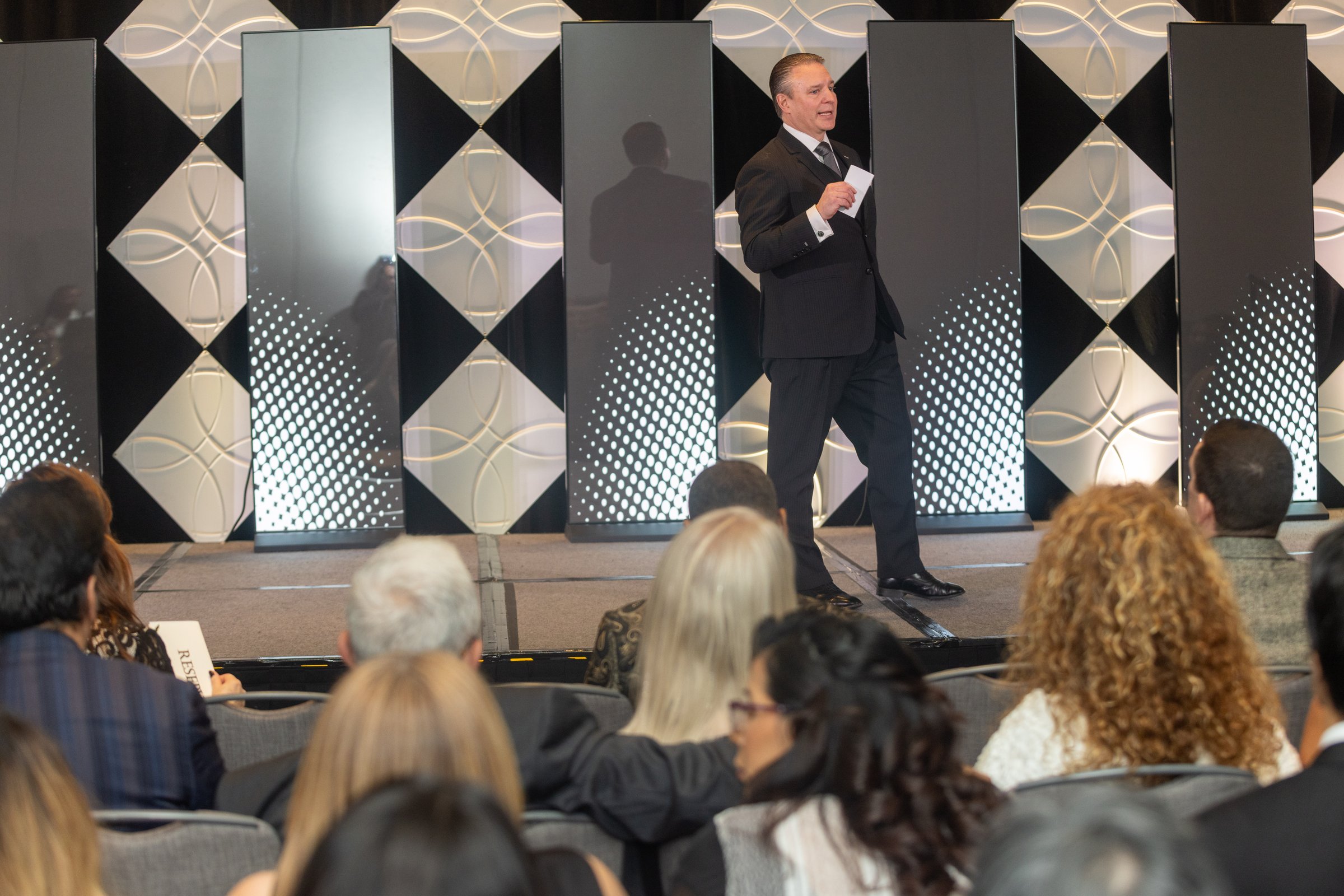 Business conference speaker photography at corporate presentation NYC